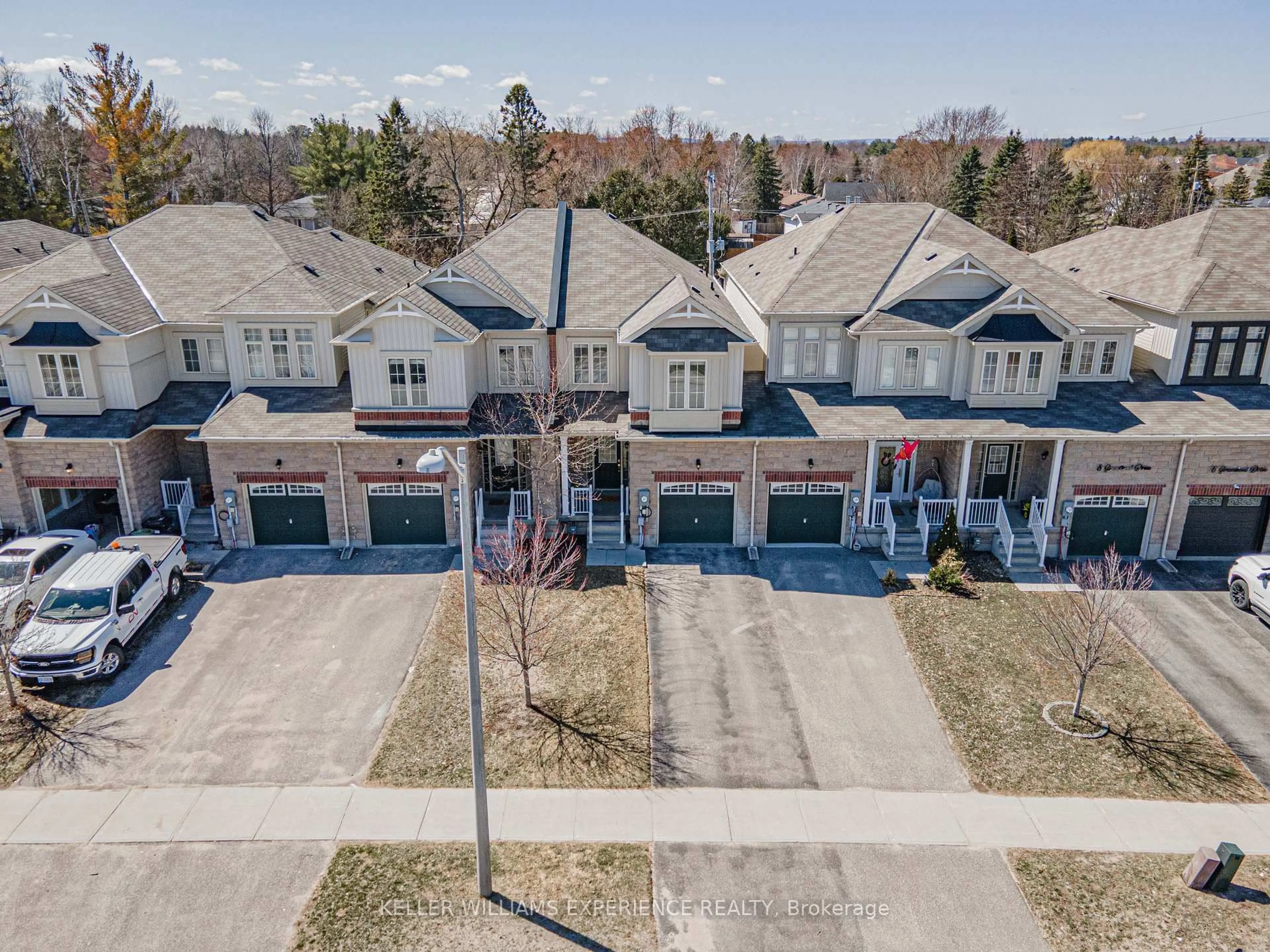A pic from outside/outdoor area/front of a property/back of a property/a pic from drone, street for 12 Greenwood Dr, Essa Ontario L3W 0N5