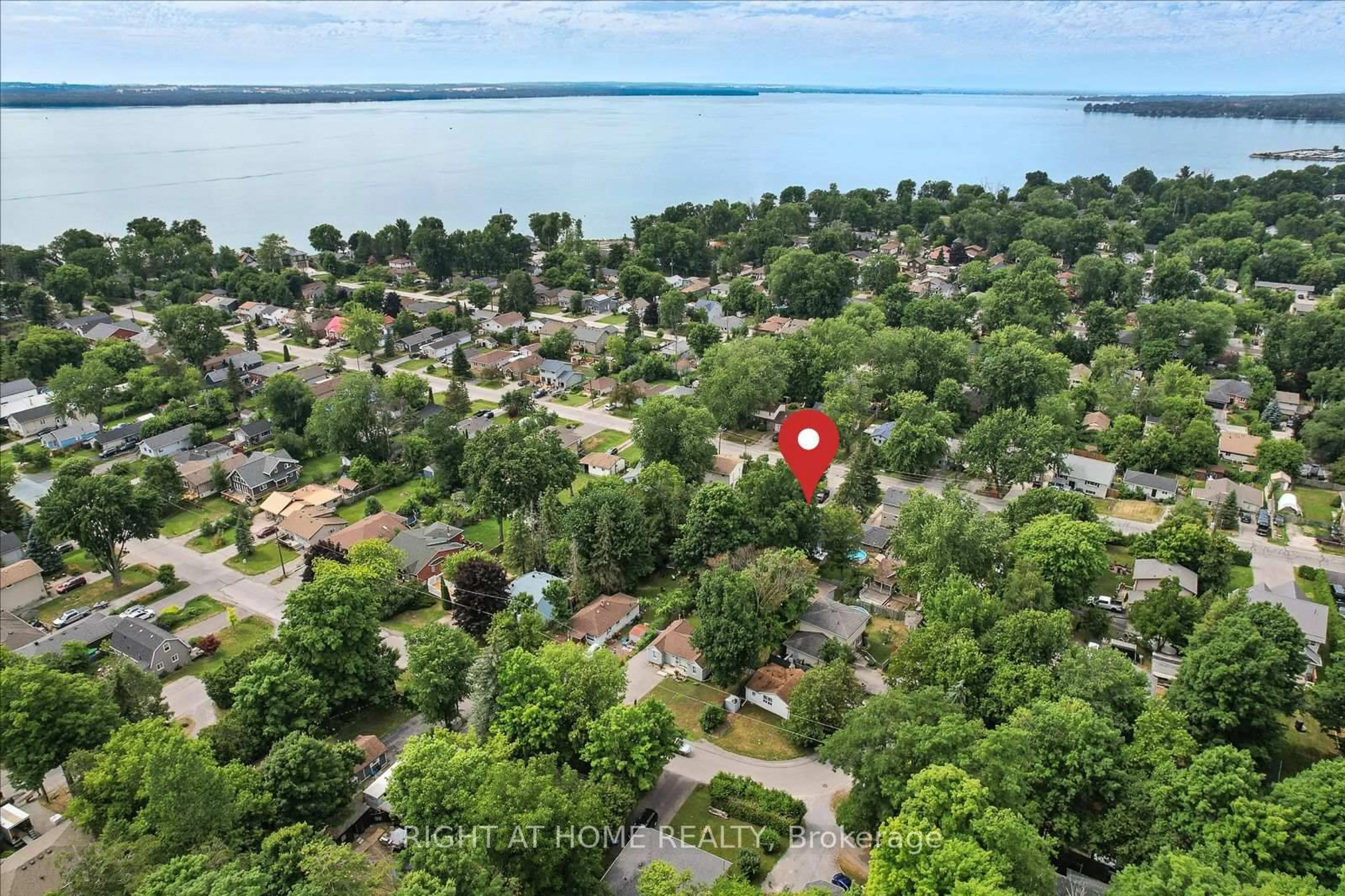 A pic from outside/outdoor area/front of a property/back of a property/a pic from drone, water/lake/river/ocean view for 259 Glenwoods Ave, Georgina Ontario L4P 2X1