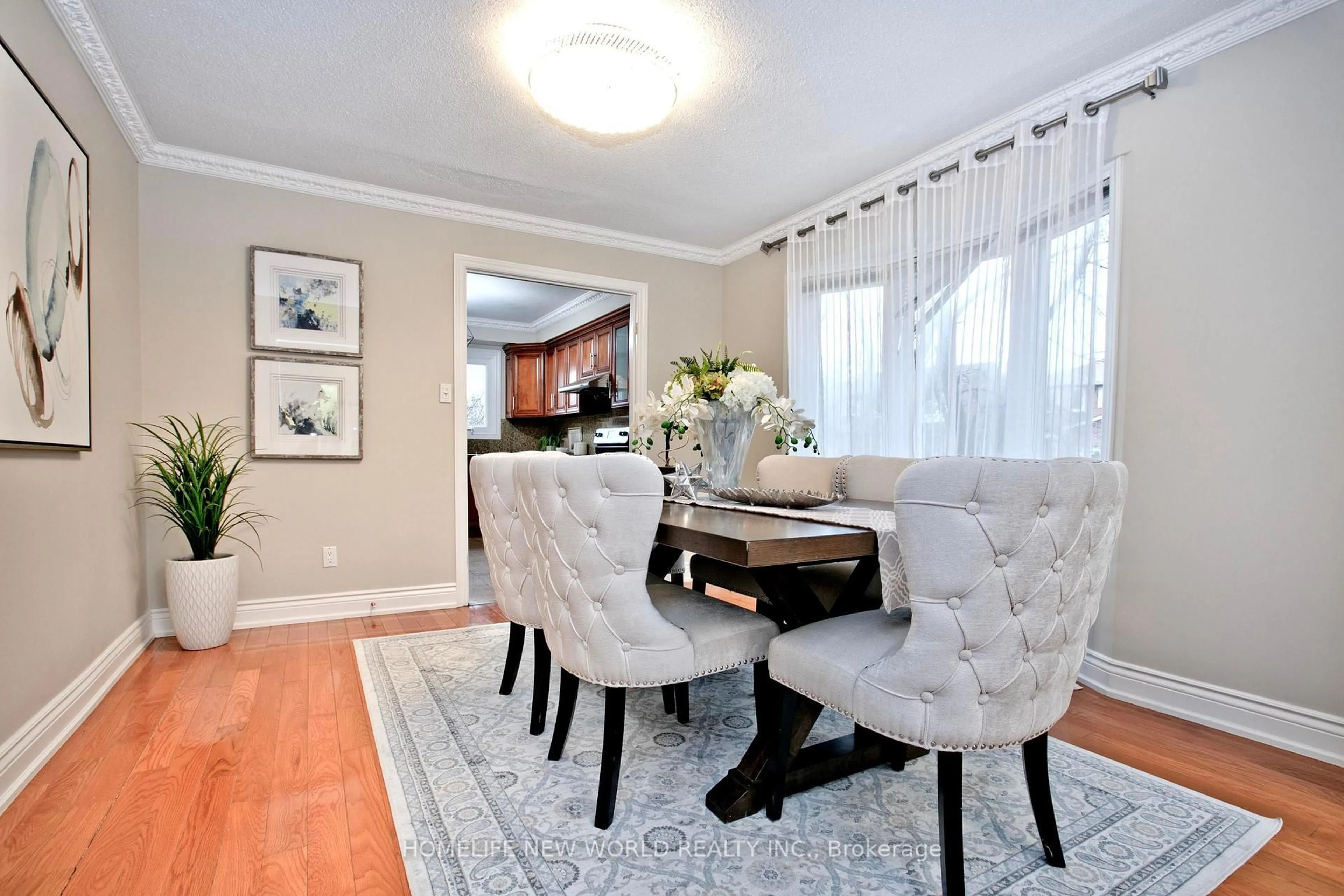 Dining room, wood/laminate floor for 61 Nadine Cres, Markham Ontario L3R 7Y7