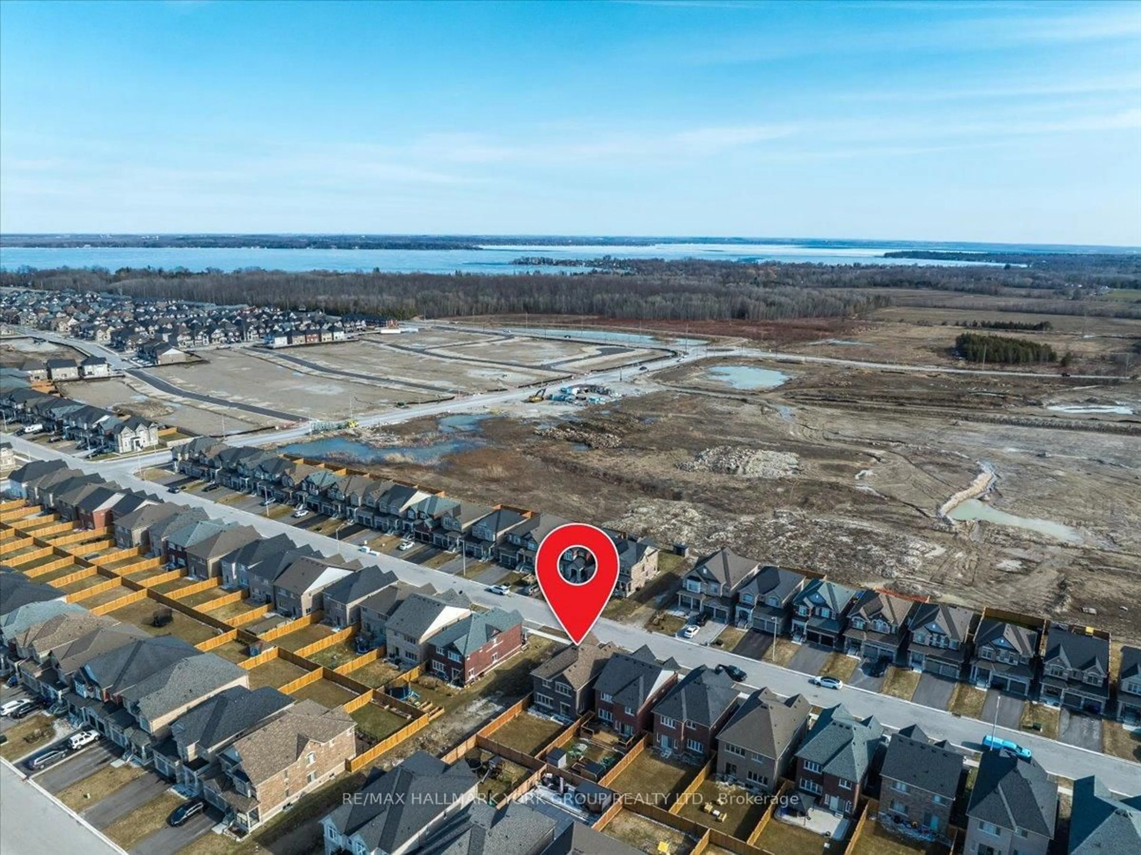 A pic from outside/outdoor area/front of a property/back of a property/a pic from drone, water/lake/river/ocean view for 1310 Broderick St, Innisfil Ontario L9S 0P5