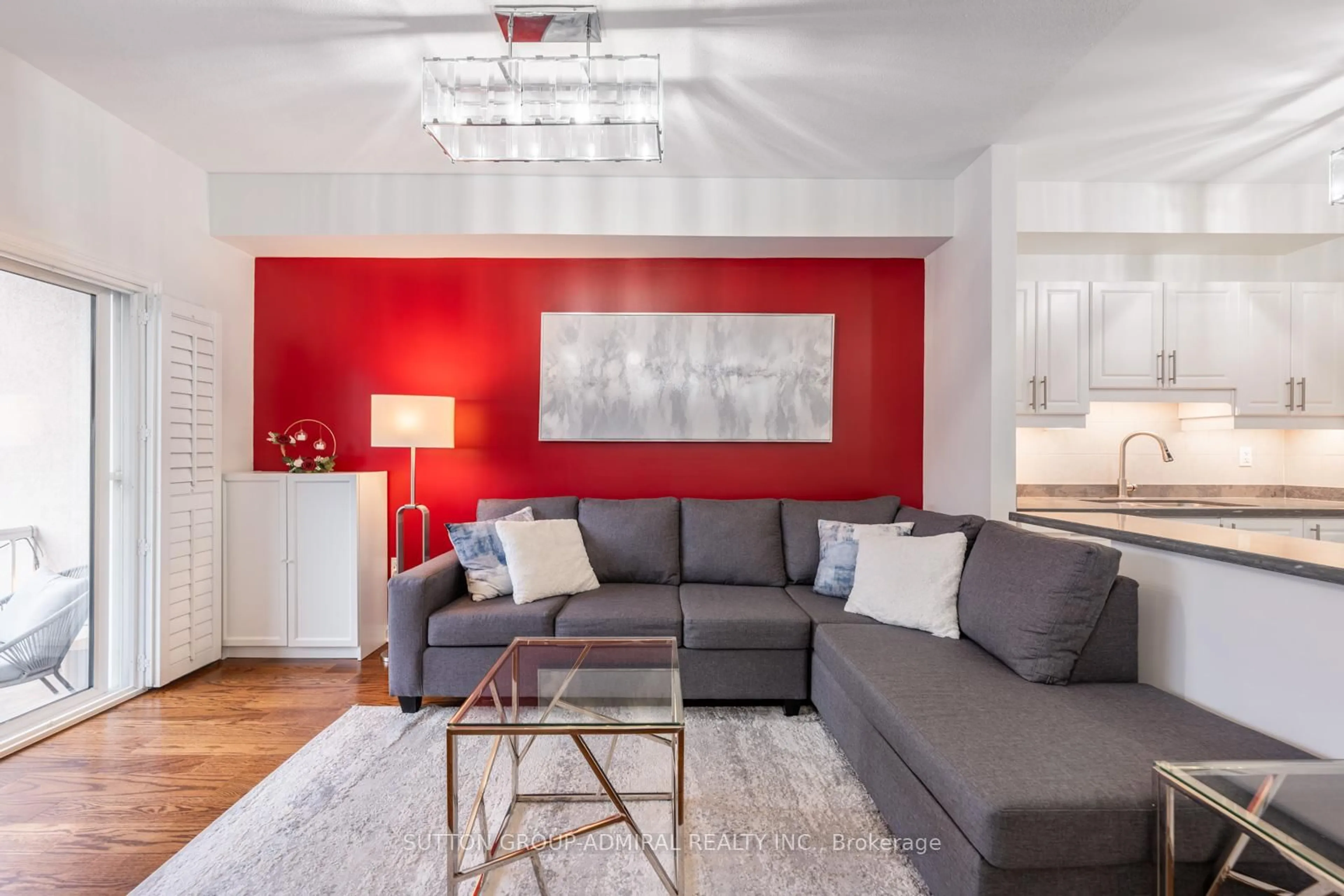 Living room with furniture, wood/laminate floor for 9944 Keele St #102, Vaughan Ontario L6A 3Z4