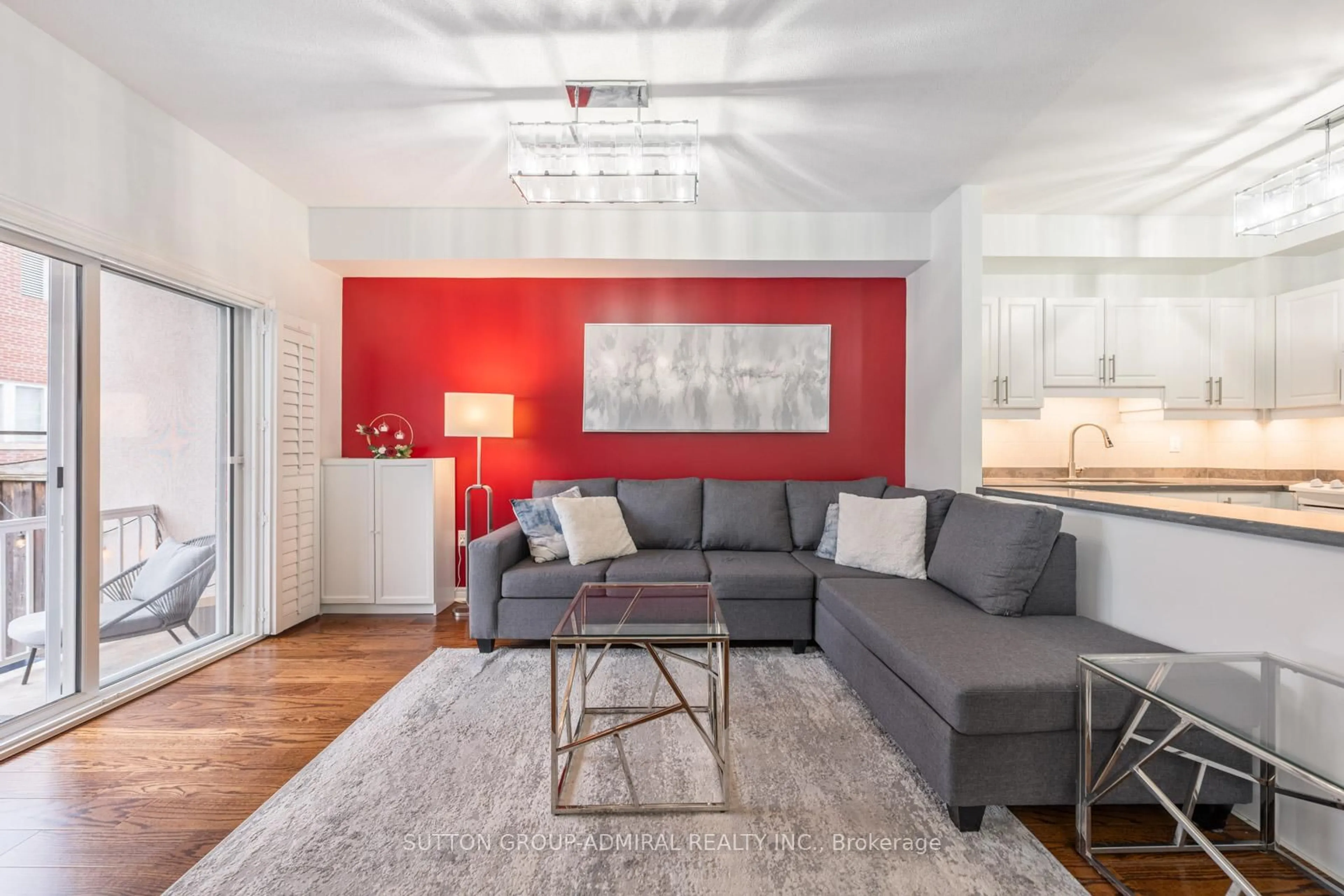 Living room with furniture, wood/laminate floor for 9944 Keele St #102, Vaughan Ontario L6A 3Z4