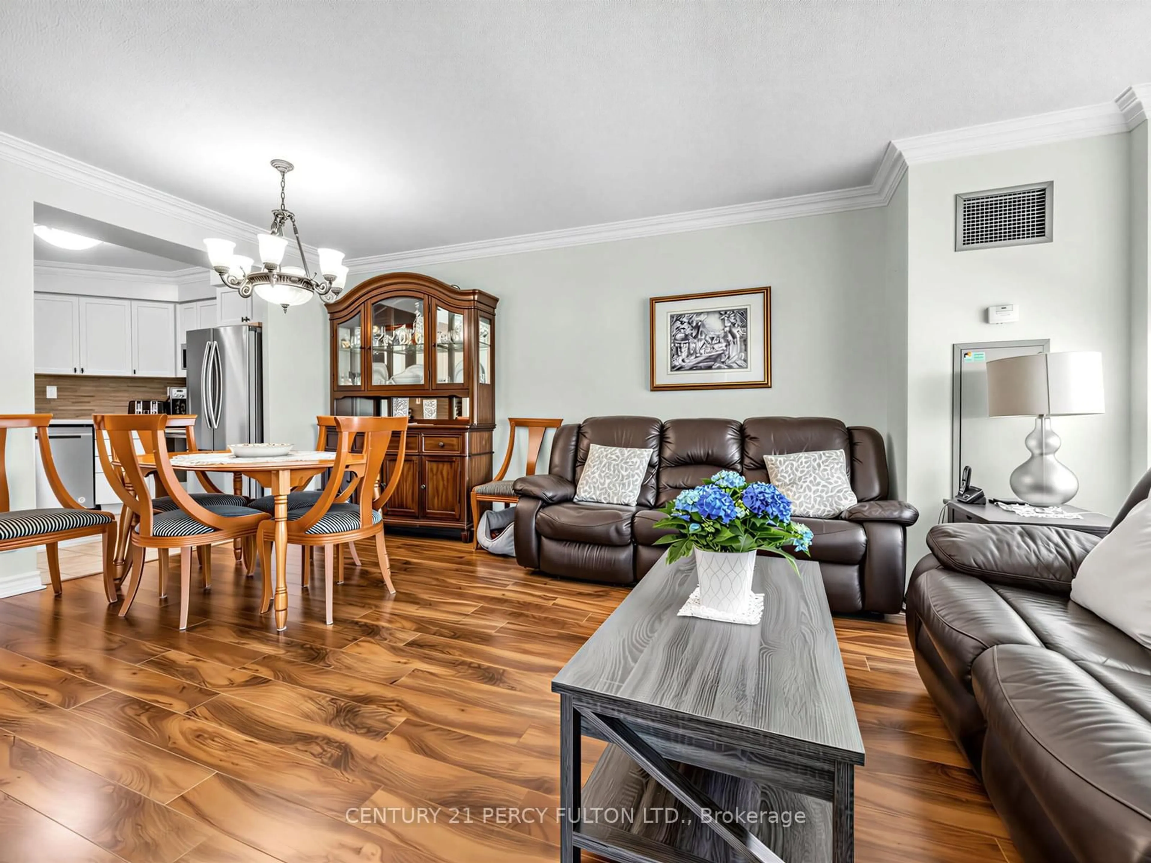 Living room with furniture, wood/laminate floor for 745 New Westminster Dr #201, Vaughan Ontario L4J 8J9