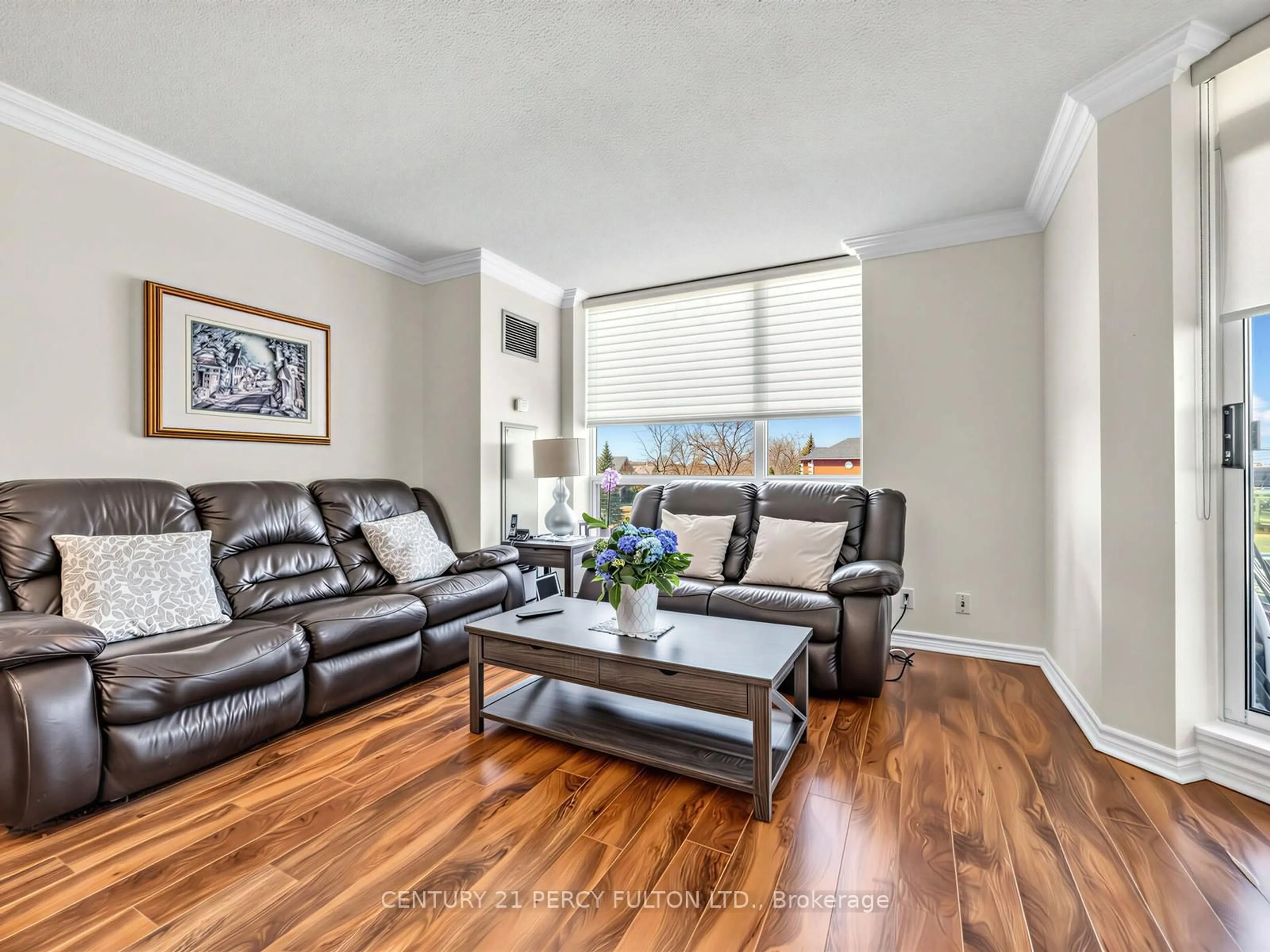 Living room with furniture, wood/laminate floor for 745 New Westminster Dr #201, Vaughan Ontario L4J 8J9