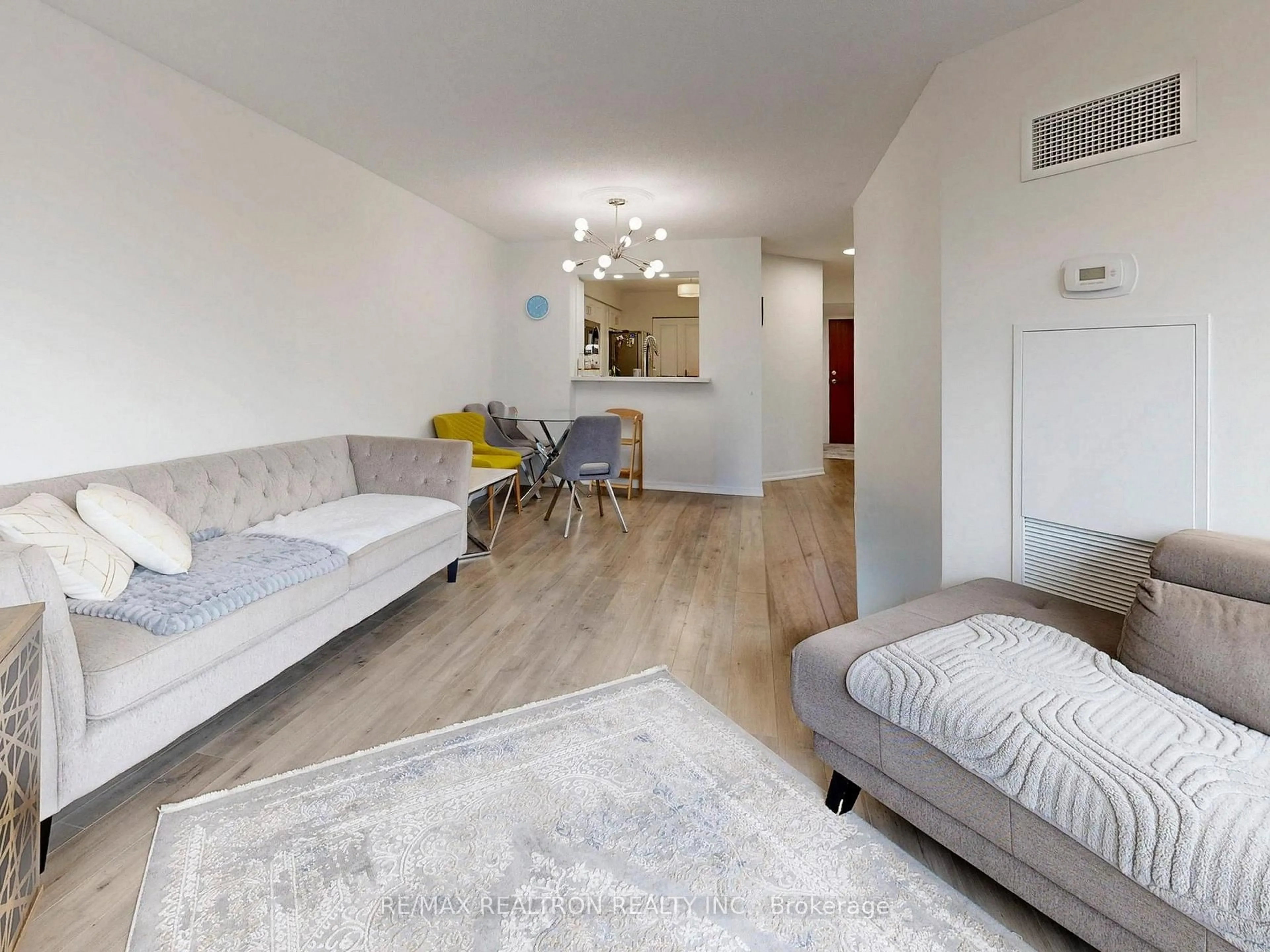 Living room with furniture, unknown for 120 Promenade Circ #406, Vaughan Ontario L4J 7W9