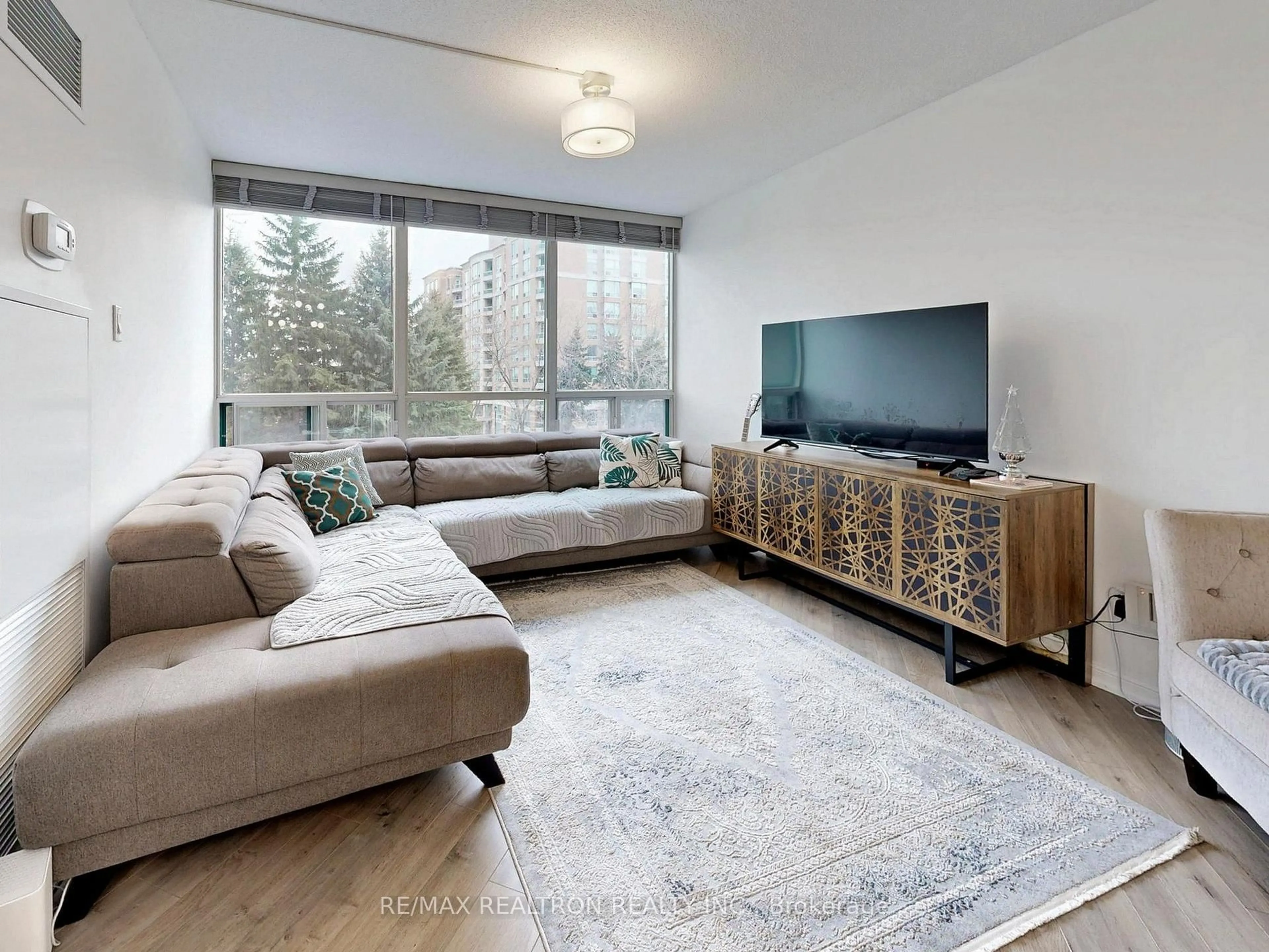 Living room with furniture, unknown for 120 Promenade Circ #406, Vaughan Ontario L4J 7W9