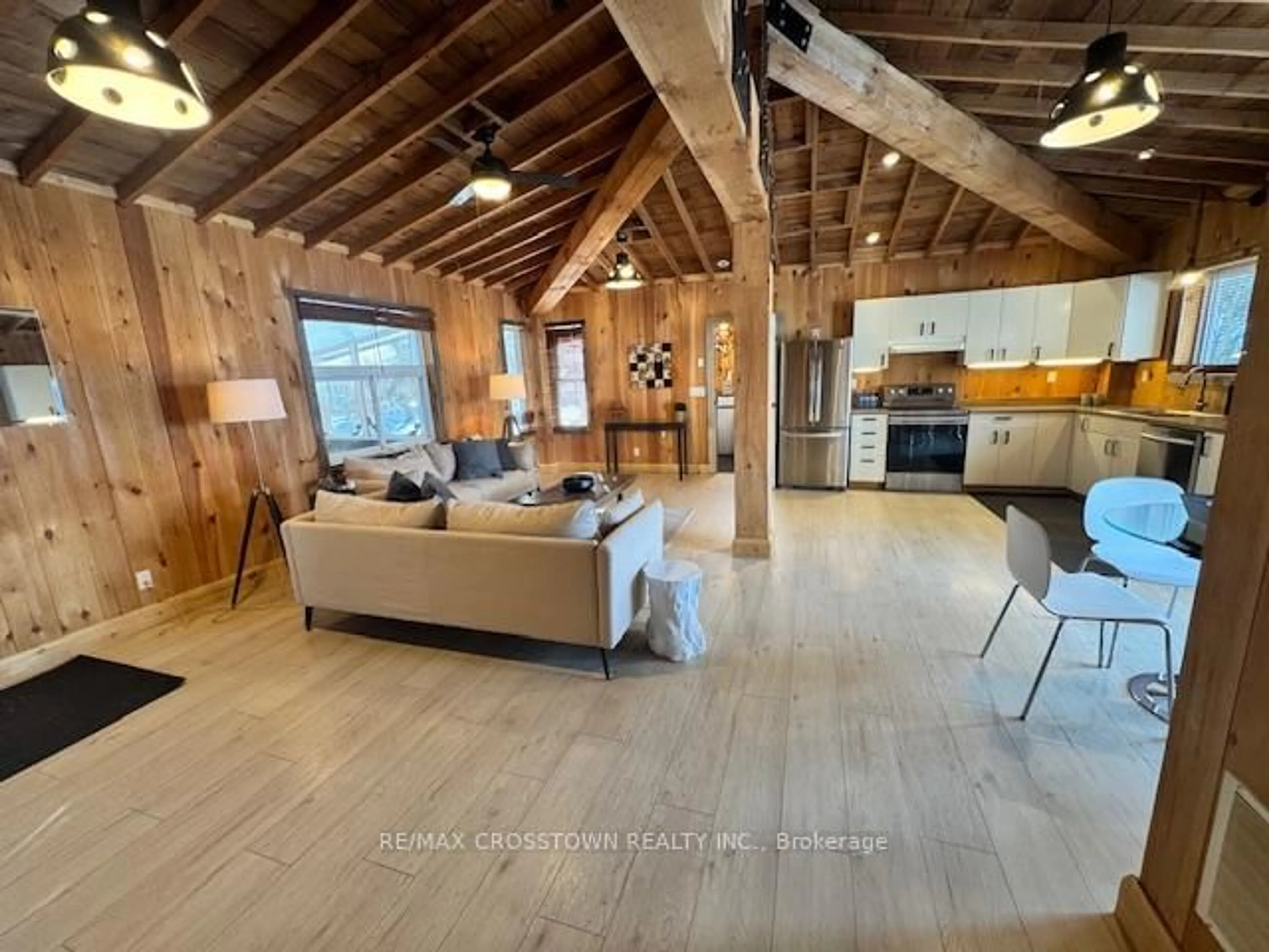 Open concept kitchen, wood/laminate floor for 1056 Elm Rd, Innisfil Ontario L9S 2E9