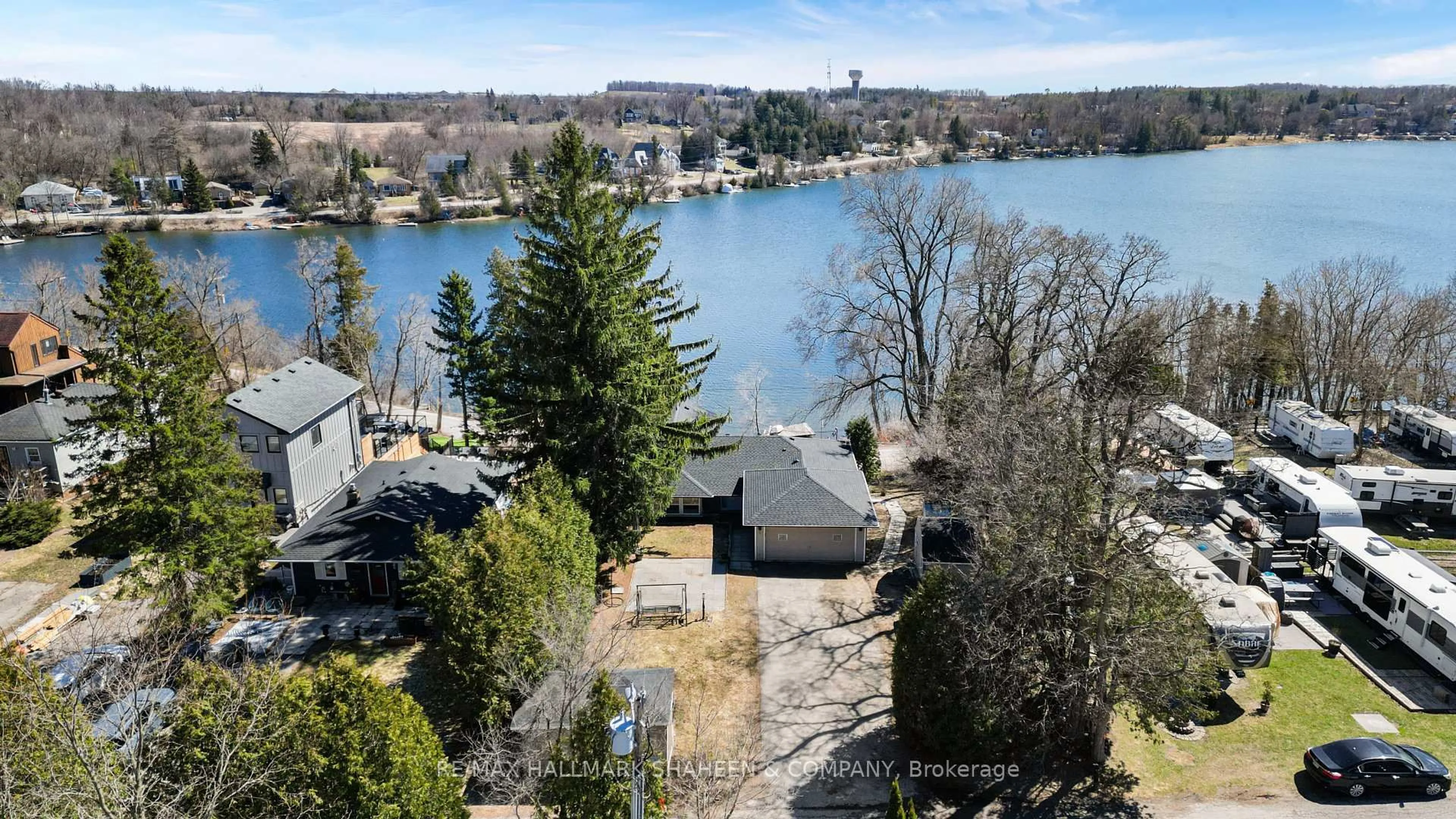 A pic from outside/outdoor area/front of a property/back of a property/a pic from drone, water/lake/river/ocean view for 9 Evans Dr, Whitchurch-Stouffville Ontario L4A 2Y4
