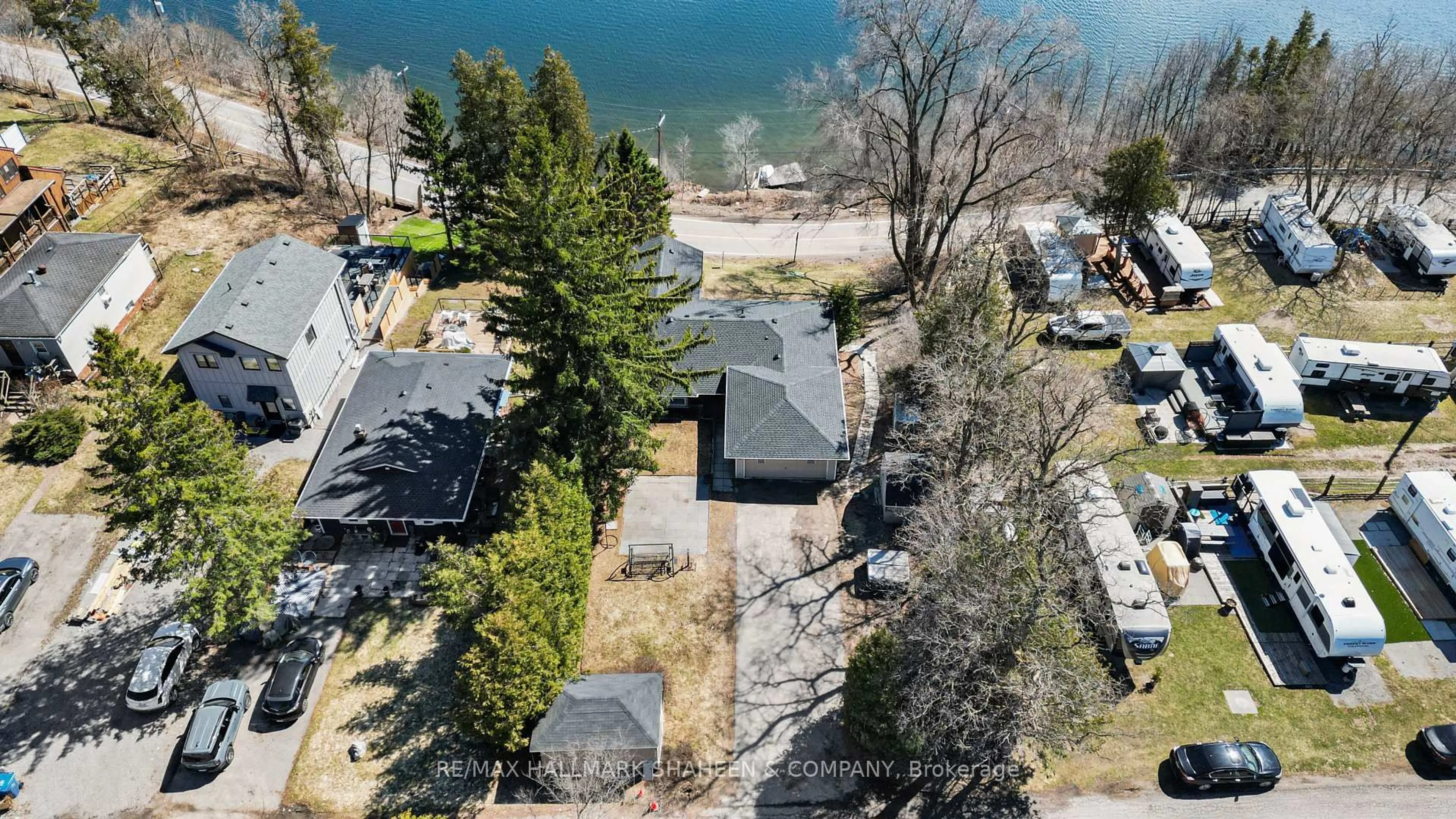 A pic from outside/outdoor area/front of a property/back of a property/a pic from drone, water/lake/river/ocean view for 9 Evans Dr, Whitchurch-Stouffville Ontario L4A 2Y4