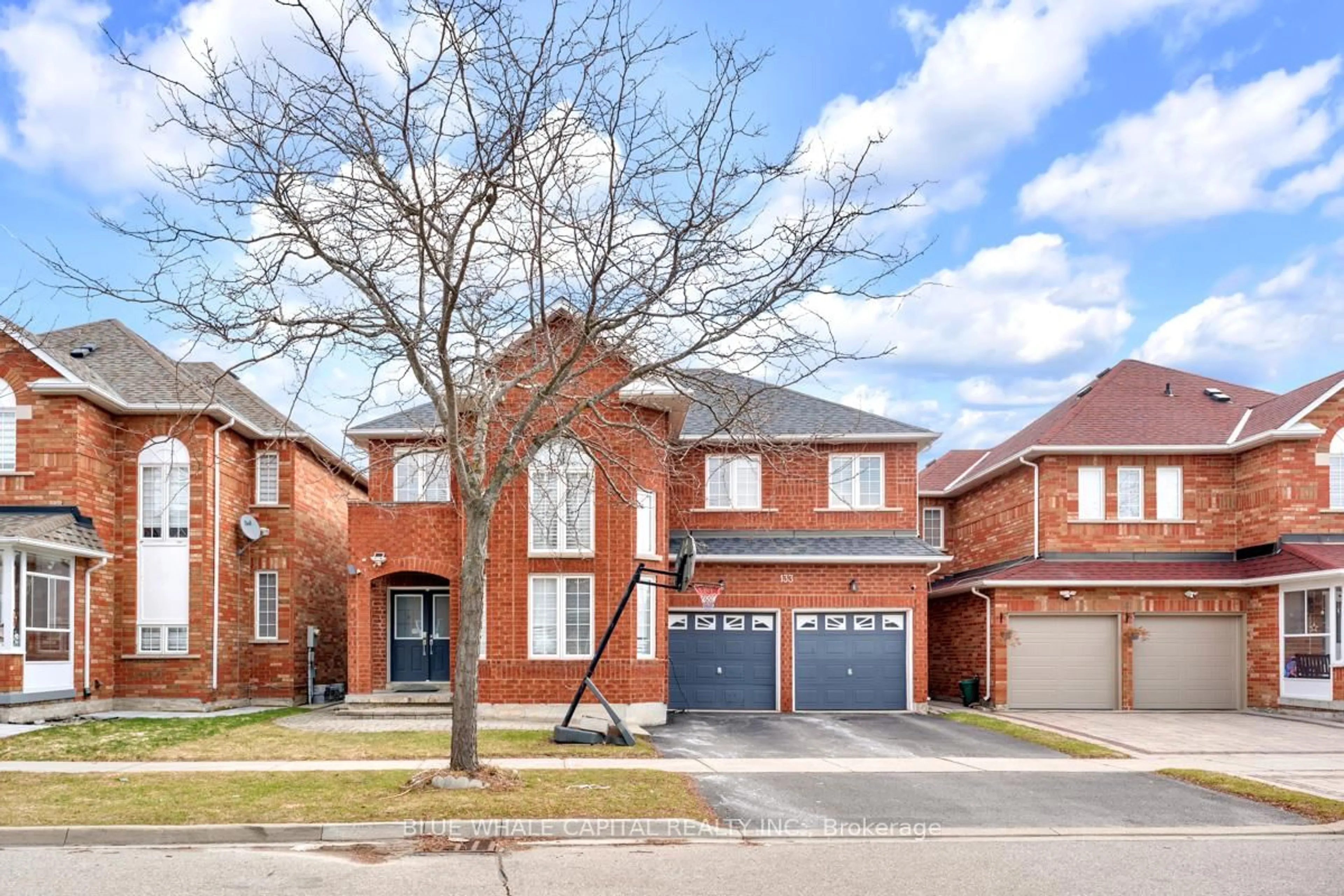 Home with brick exterior material, street for 133 Orchard Hill Blvd, Markham Ontario L6C 2W9