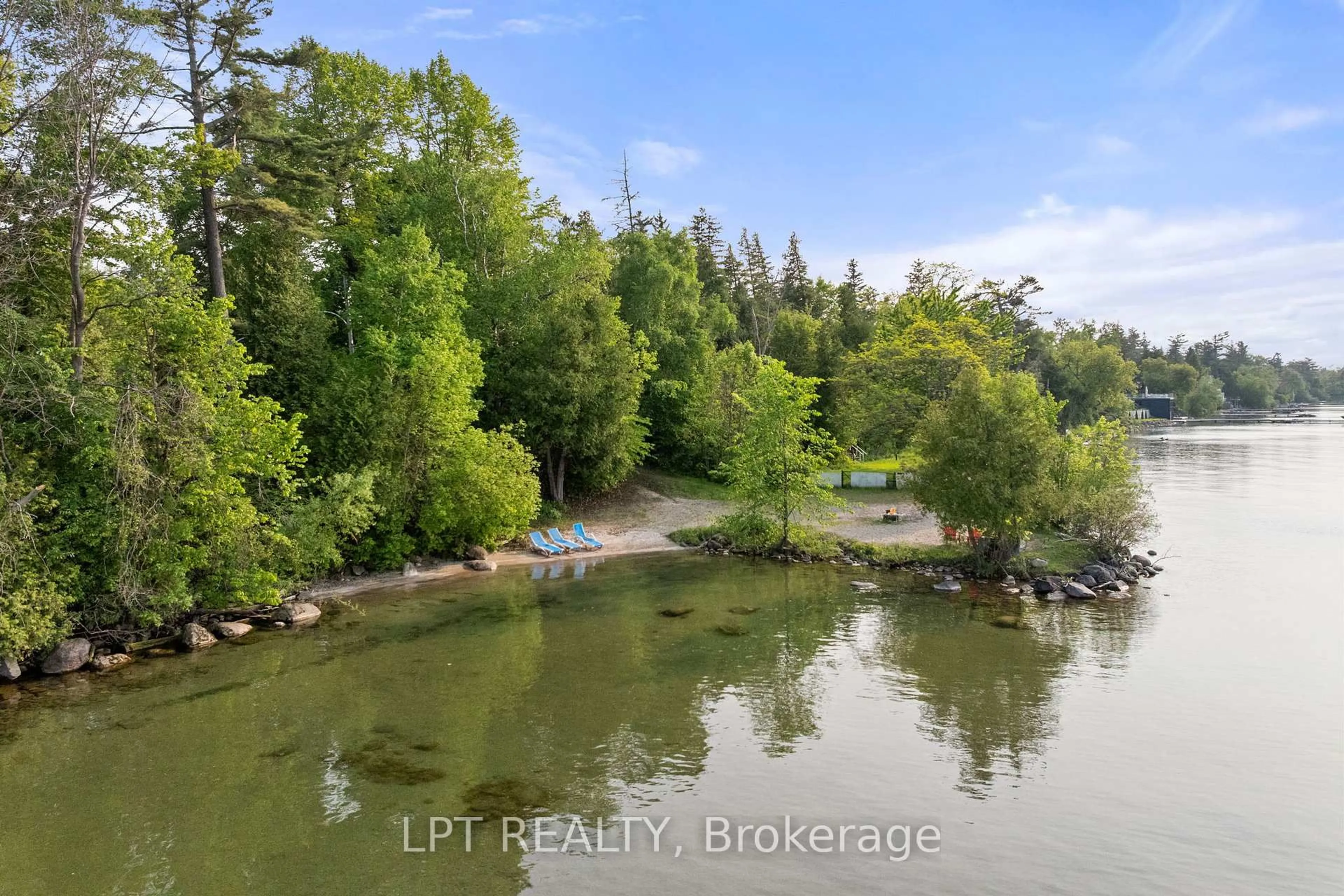 A pic from outside/outdoor area/front of a property/back of a property/a pic from drone, water/lake/river/ocean view for 10 Maplewood Lane, Georgina Ontario L0E 1R0