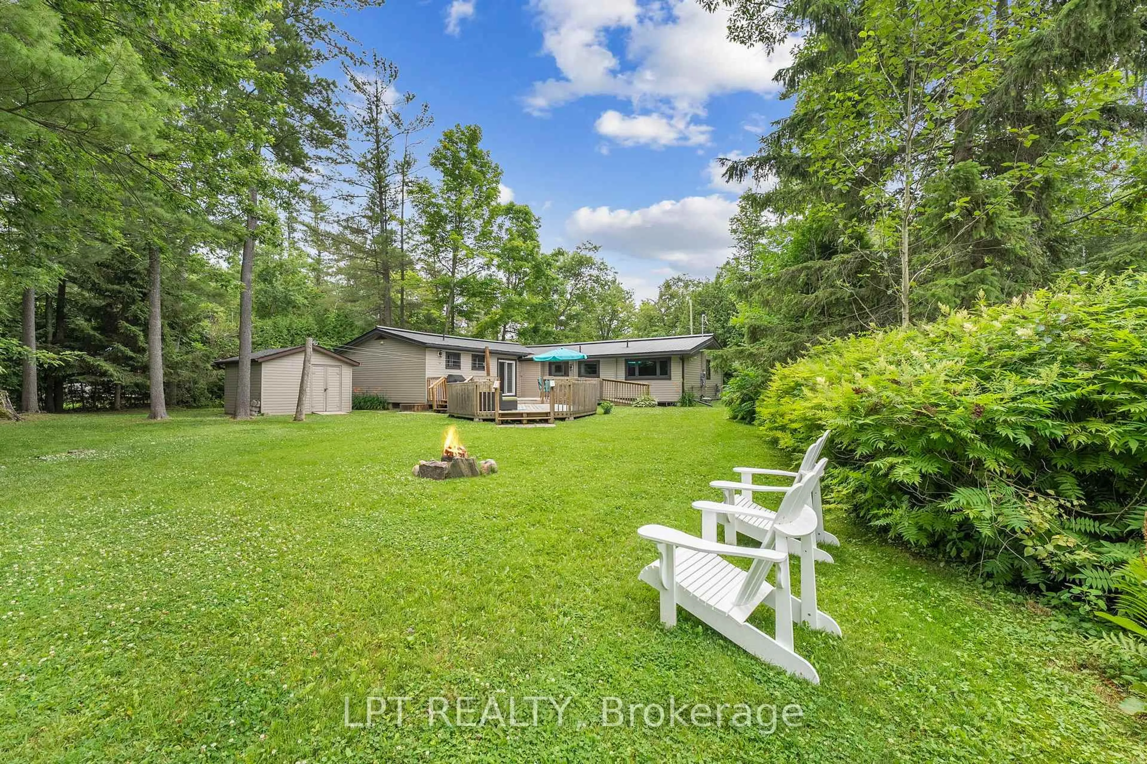 A pic from outside/outdoor area/front of a property/back of a property/a pic from drone, water/lake/river/ocean view for 10 Maplewood Lane, Georgina Ontario L0E 1R0