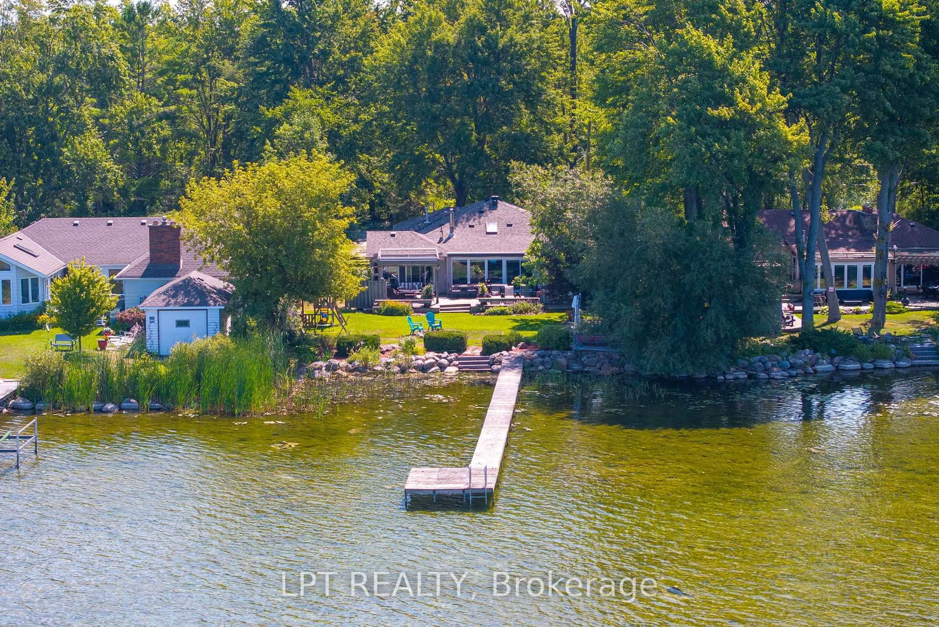 A pic from outside/outdoor area/front of a property/back of a property/a pic from drone, water/lake/river/ocean view for 76 Mcrae Beach Rd, Georgina Ontario L0E 1N0