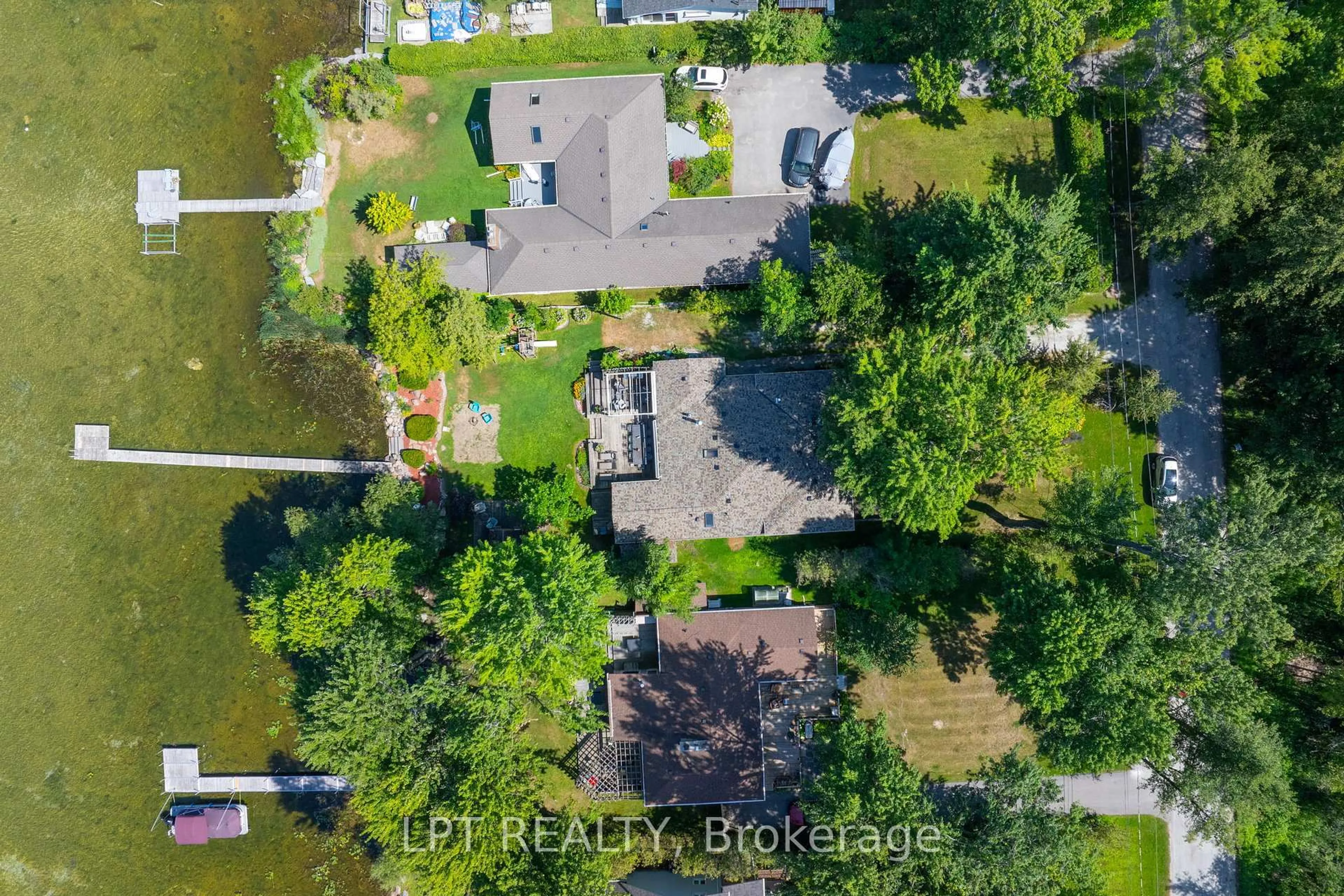 A pic from outside/outdoor area/front of a property/back of a property/a pic from drone, water/lake/river/ocean view for 76 Mcrae Beach Rd, Georgina Ontario L0E 1N0