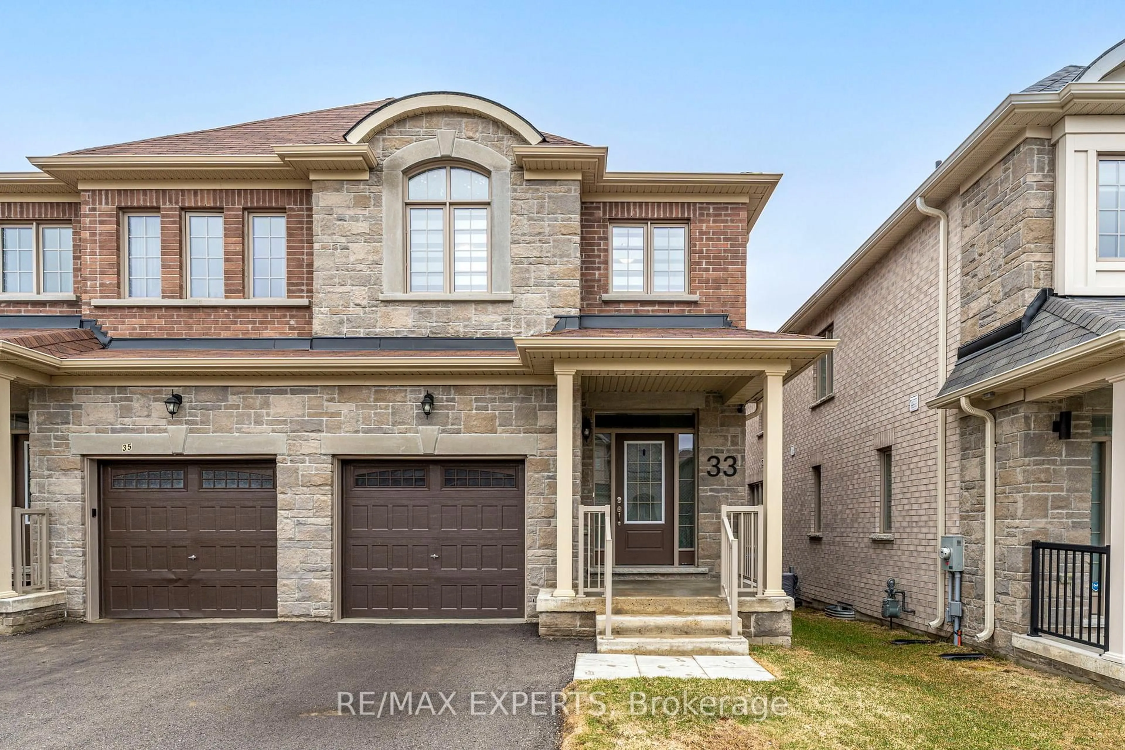 Home with brick exterior material, street for 33 Frederick Taylor Way, East Gwillimbury Ontario L0G 1M0