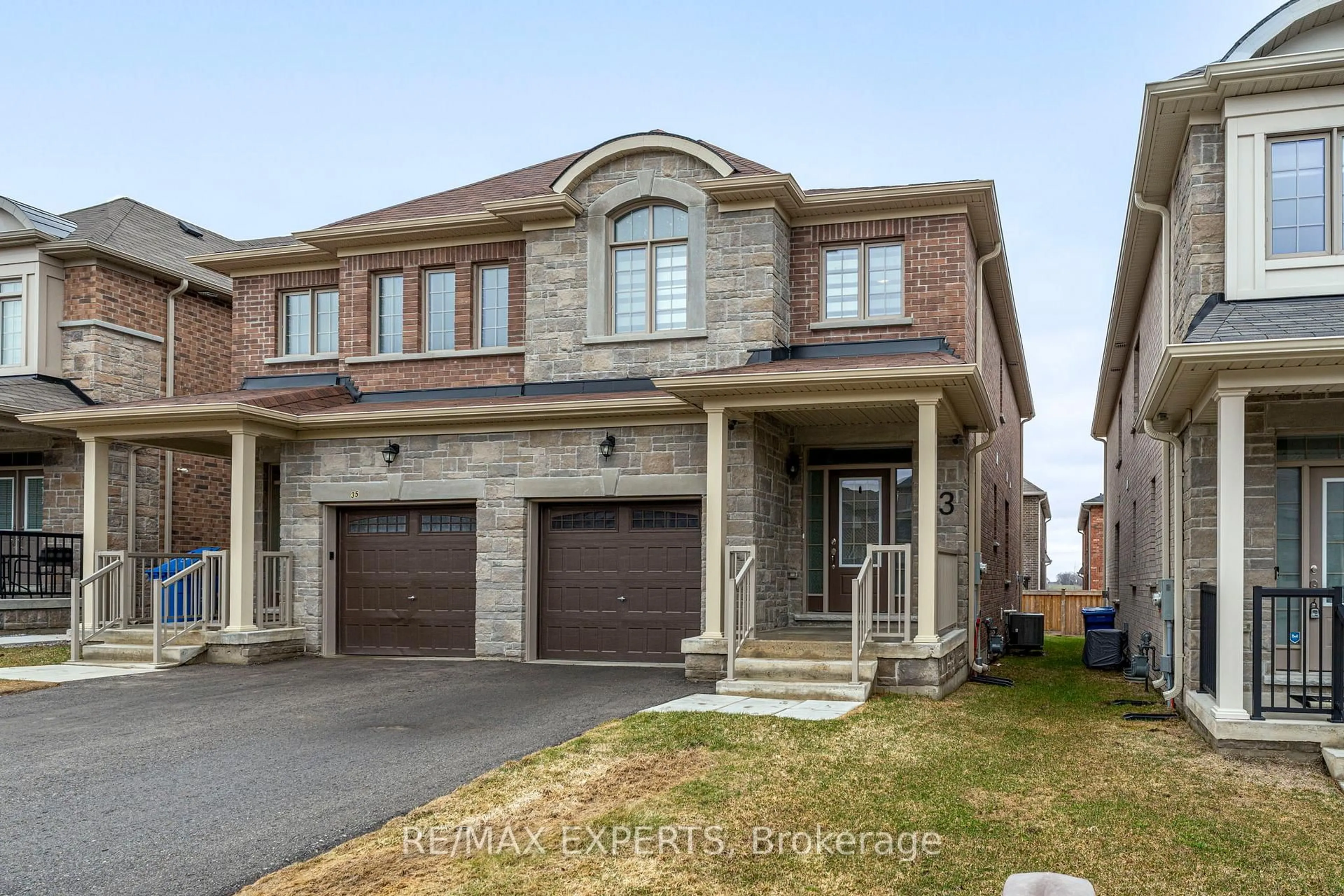 Home with brick exterior material, street for 33 Frederick Taylor Way, East Gwillimbury Ontario L0G 1M0