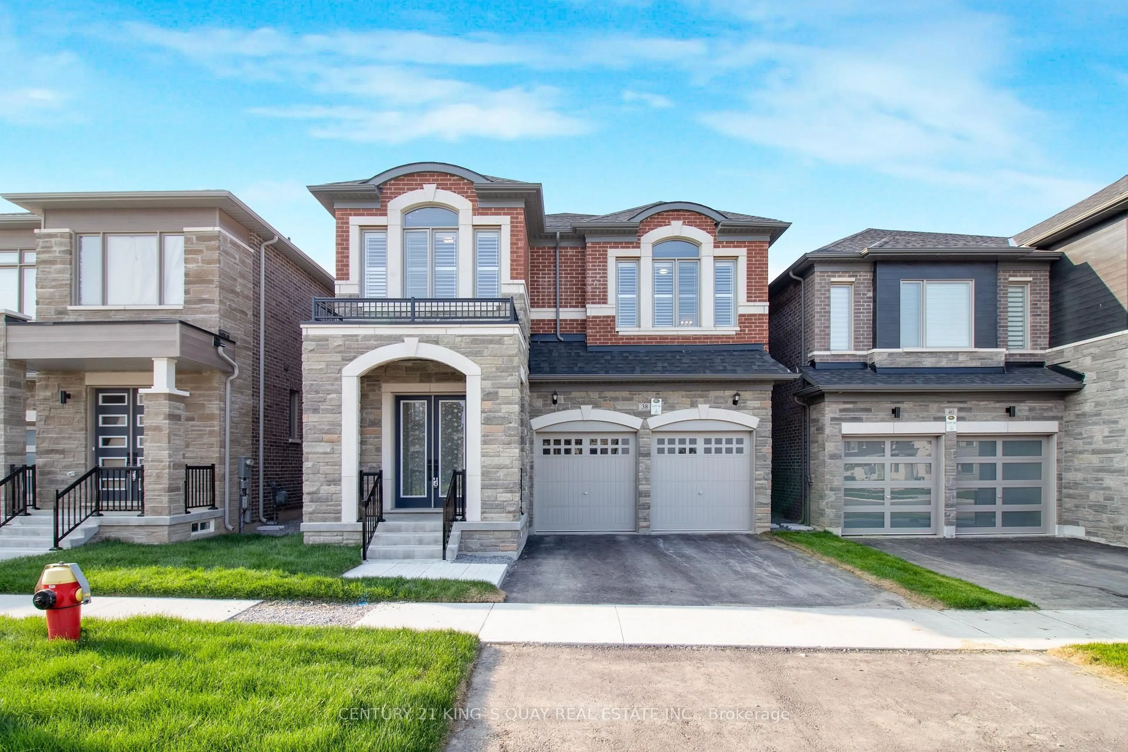 Home with brick exterior material, street for 38 Tipp Dr, Richmond Hill Ontario L4E 1J3