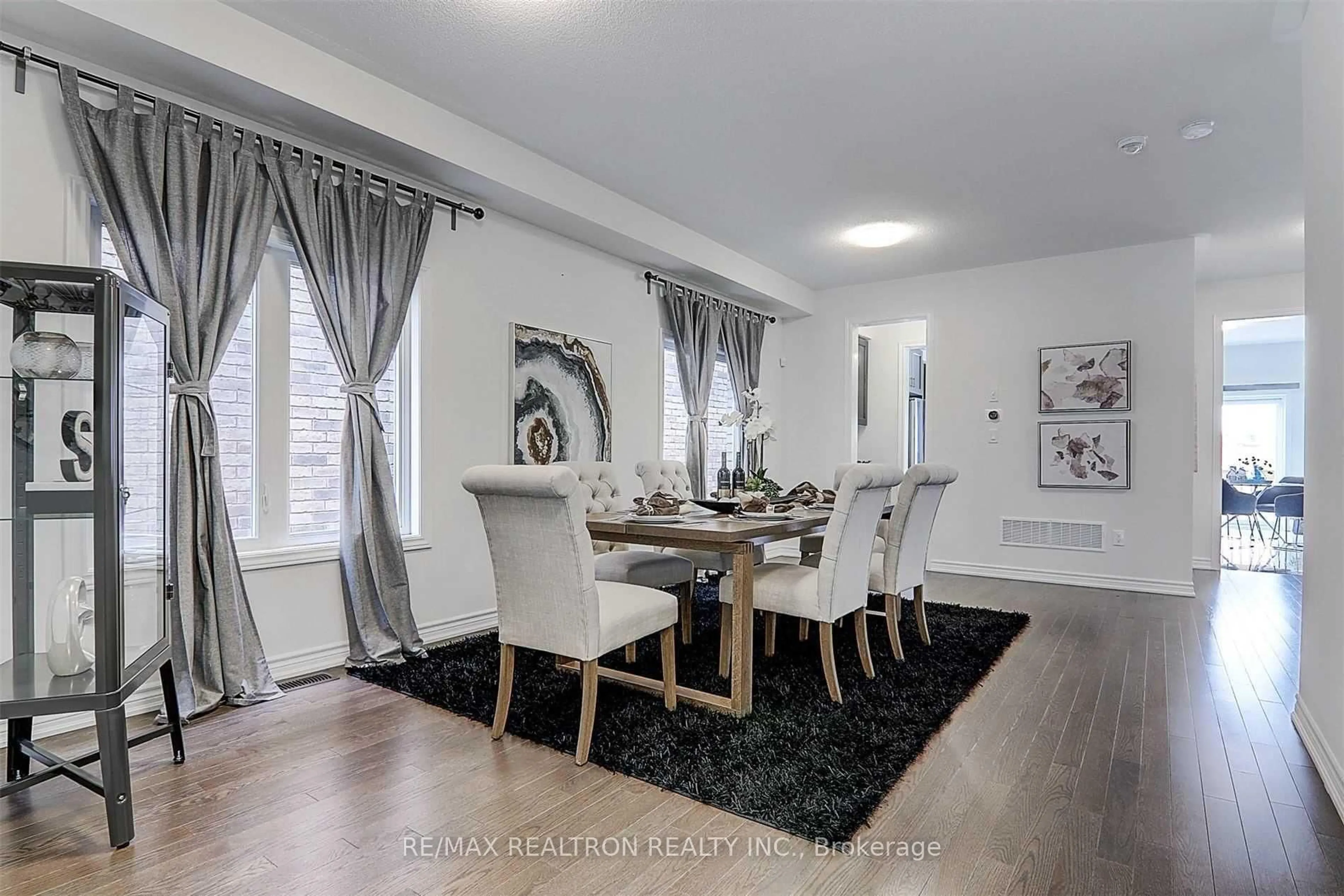 Dining room, wood/laminate floor for 112 Connell Dr, Georgina Ontario L4P 0K3