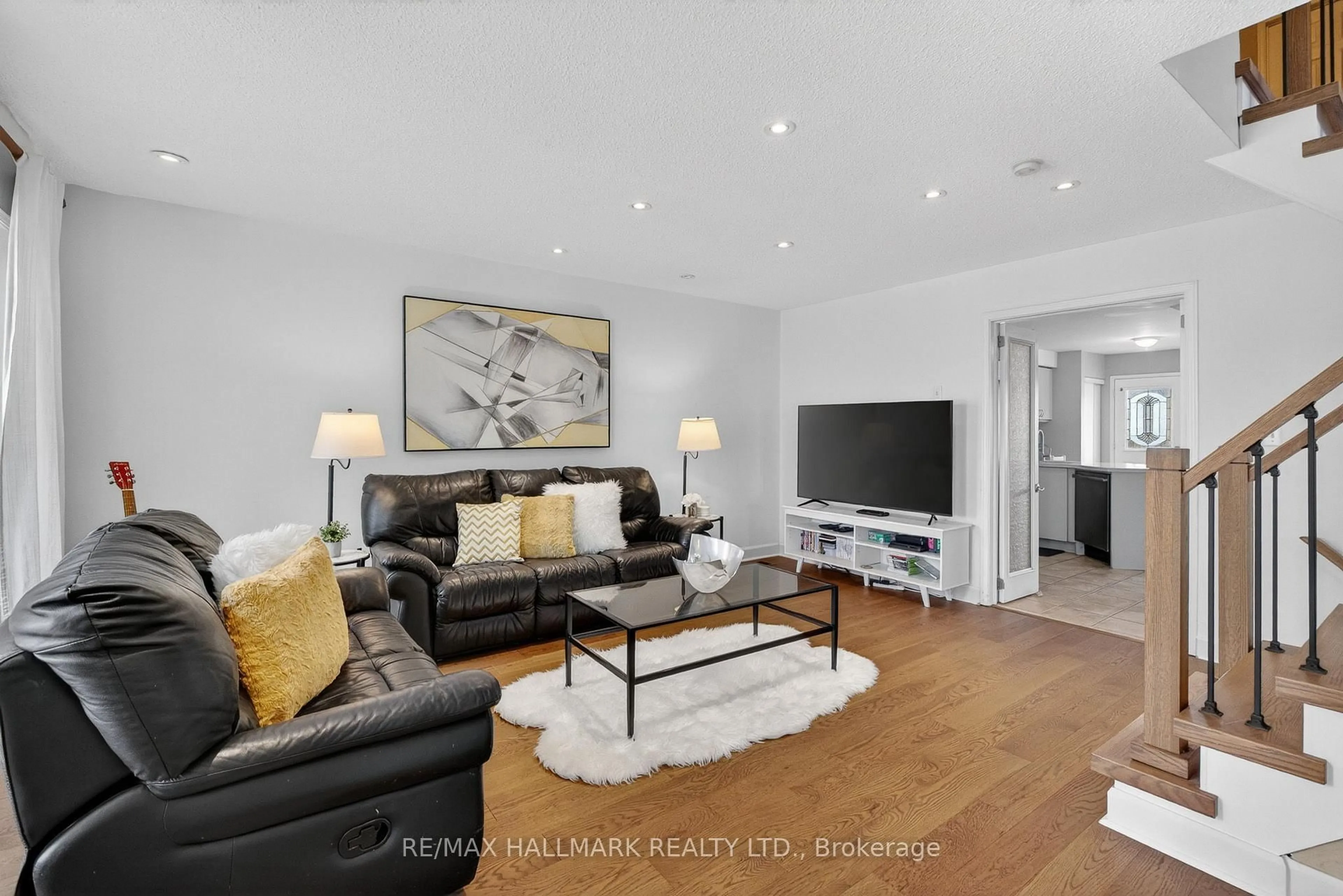 Living room with furniture, wood/laminate floor for 626 Napa Valley Ave, Vaughan Ontario L4H 1R1