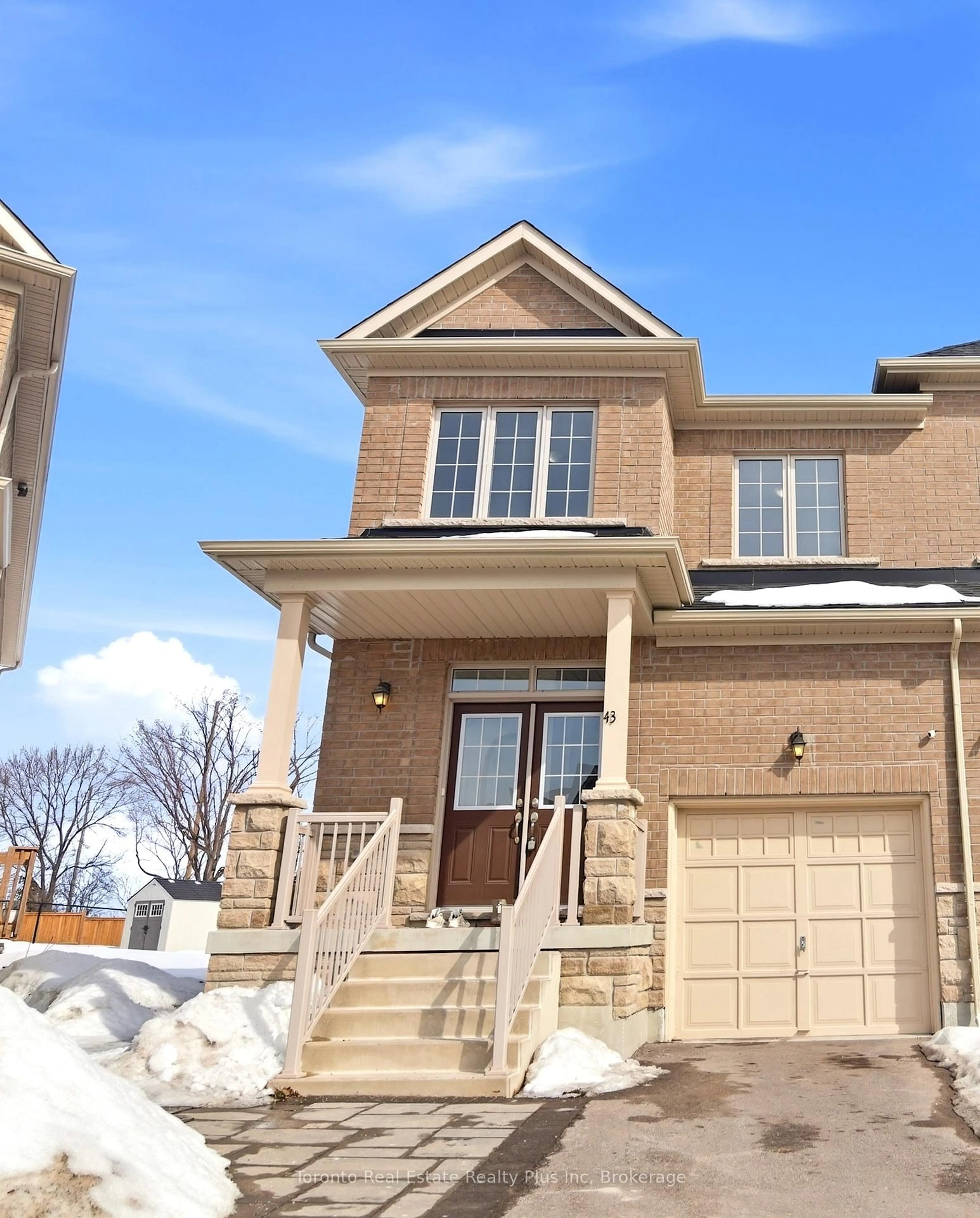 Home with brick exterior material, street for 43 Erintol Way, Markham Ontario L3S 3J5