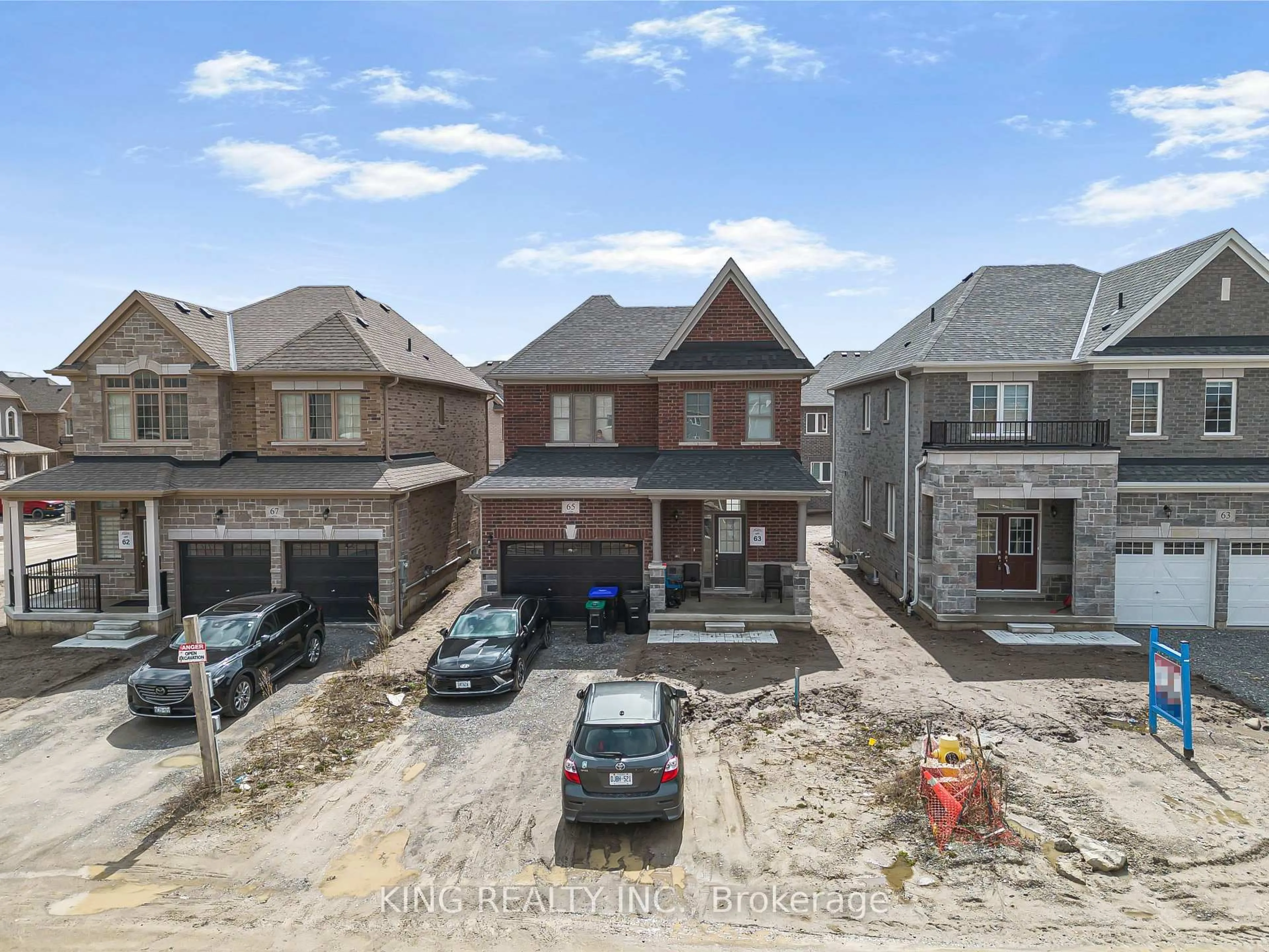 A pic from outside/outdoor area/front of a property/back of a property/a pic from drone, street for 65 English Dr, New Tecumseth Ontario L0G 1A0