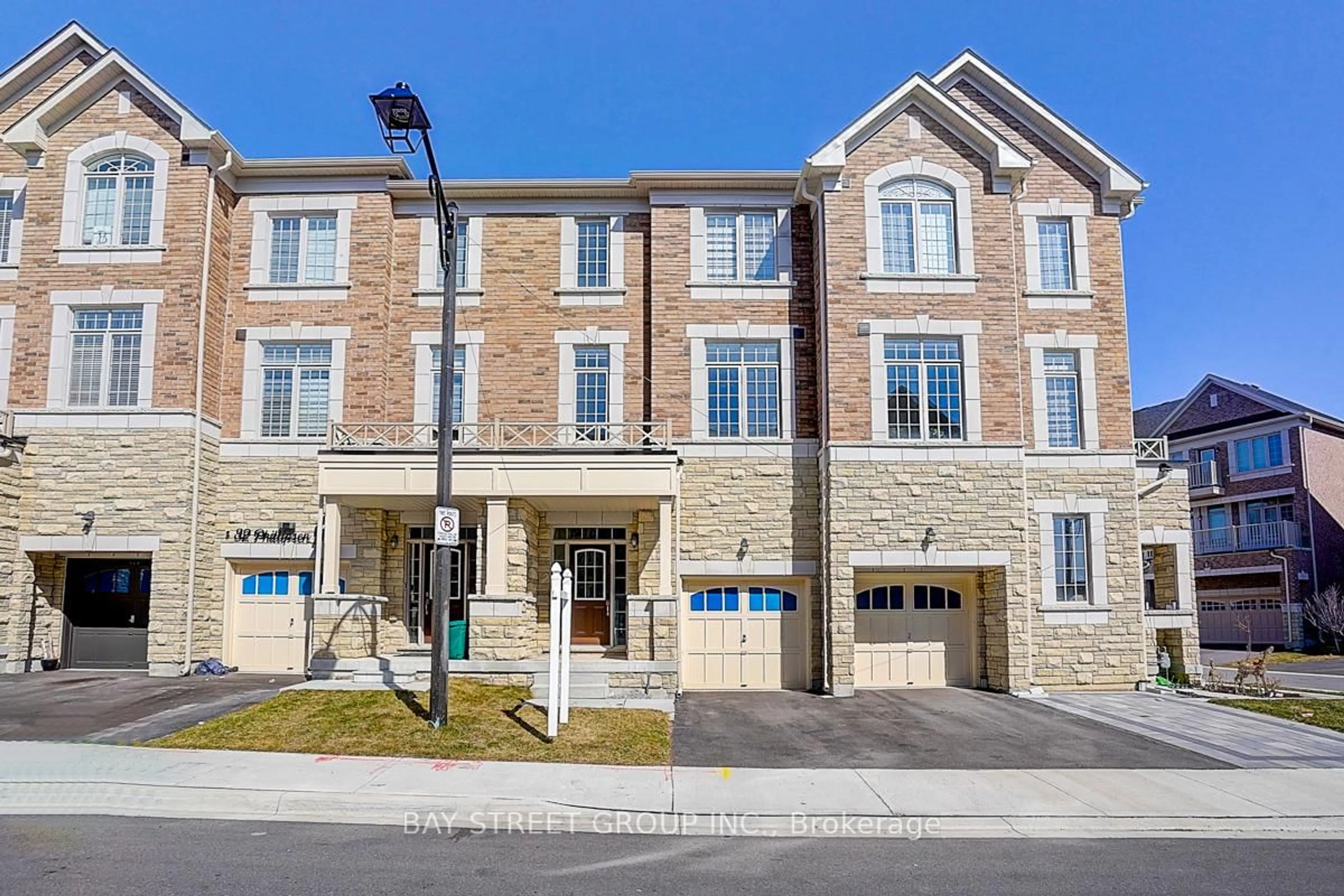 Home with brick exterior material, street for 34 Phillipsen Way, Markham Ontario L3S 0E9