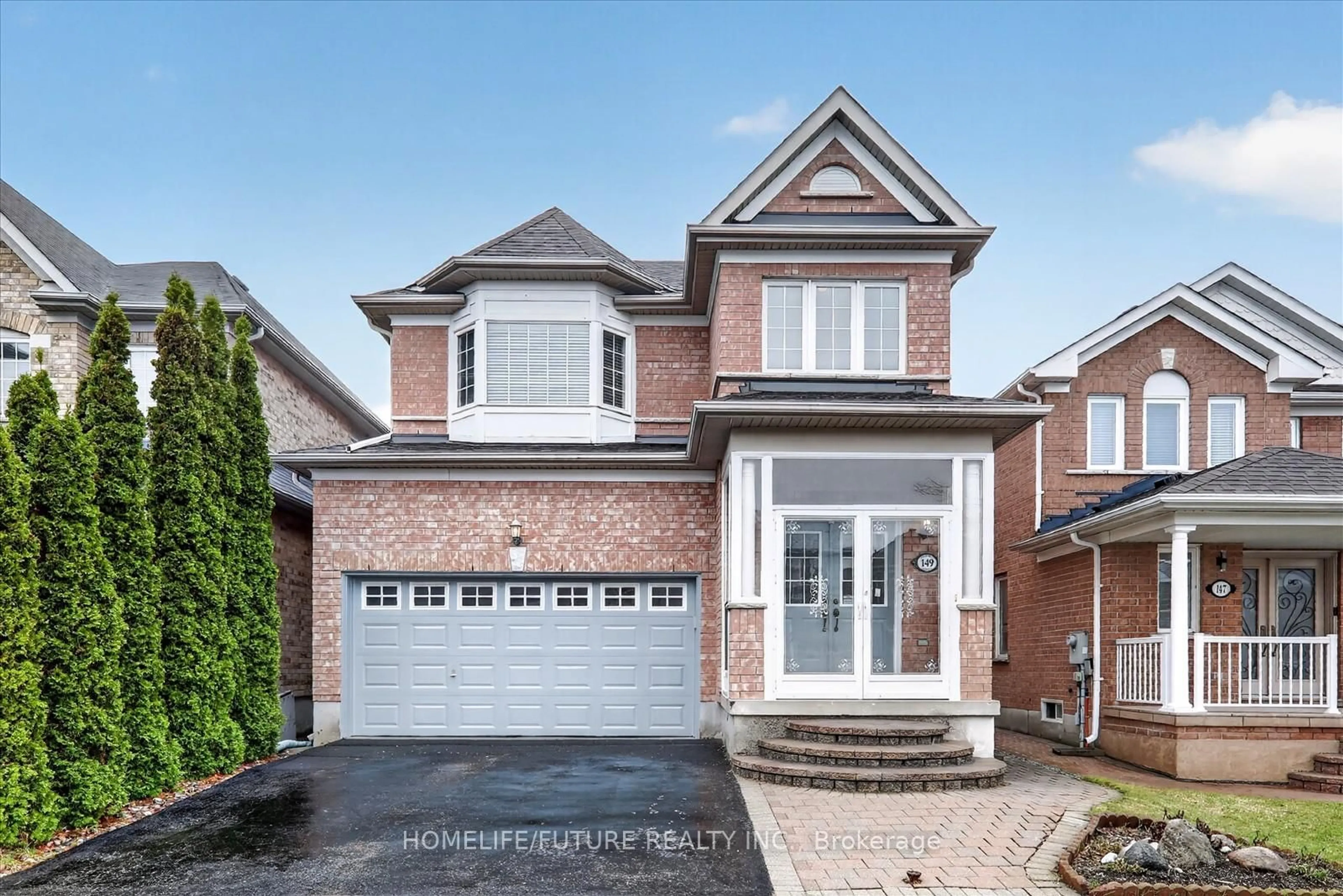 Home with brick exterior material, street for 149 Peshawar Ave, Markham Ontario L3R 0W8