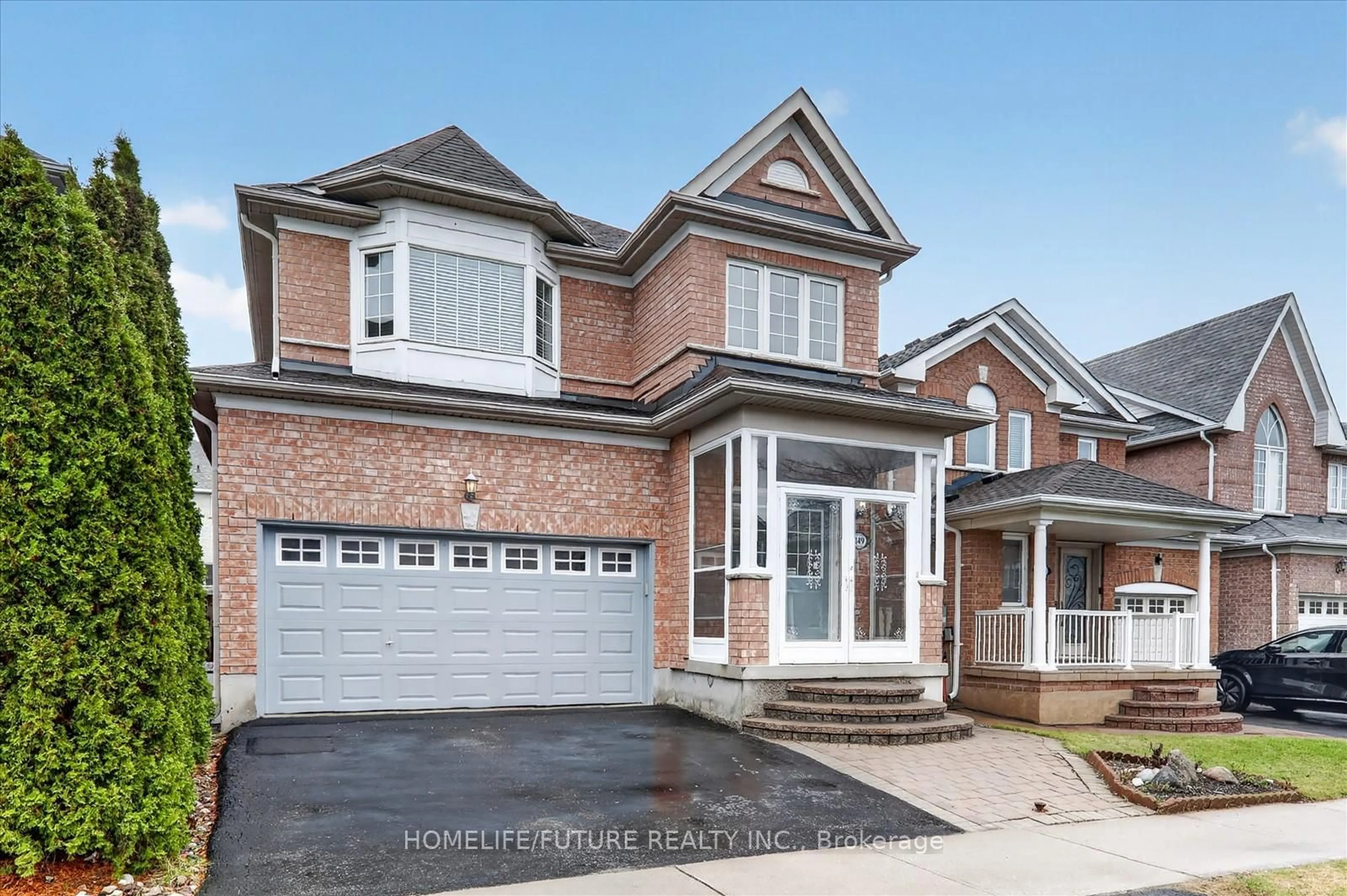Home with brick exterior material, street for 149 Peshawar Ave, Markham Ontario L3R 0W8