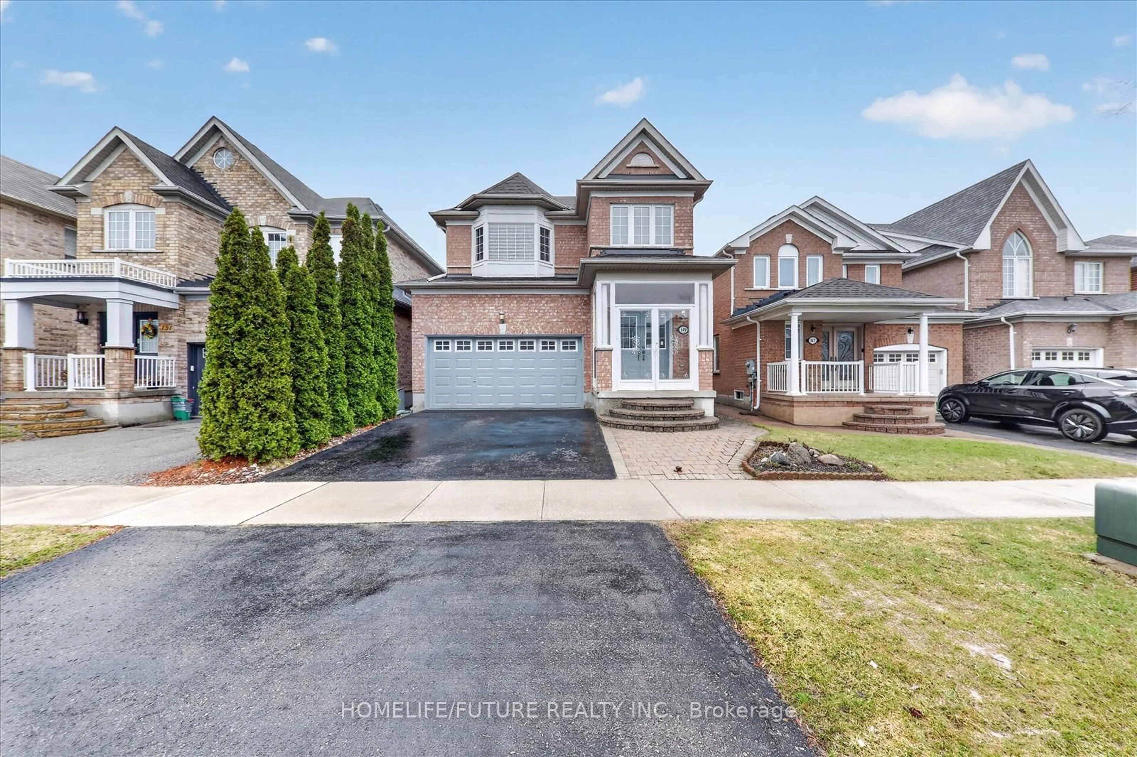 Home with brick exterior material, street for 149 Peshawar Ave, Markham Ontario L3R 0W8