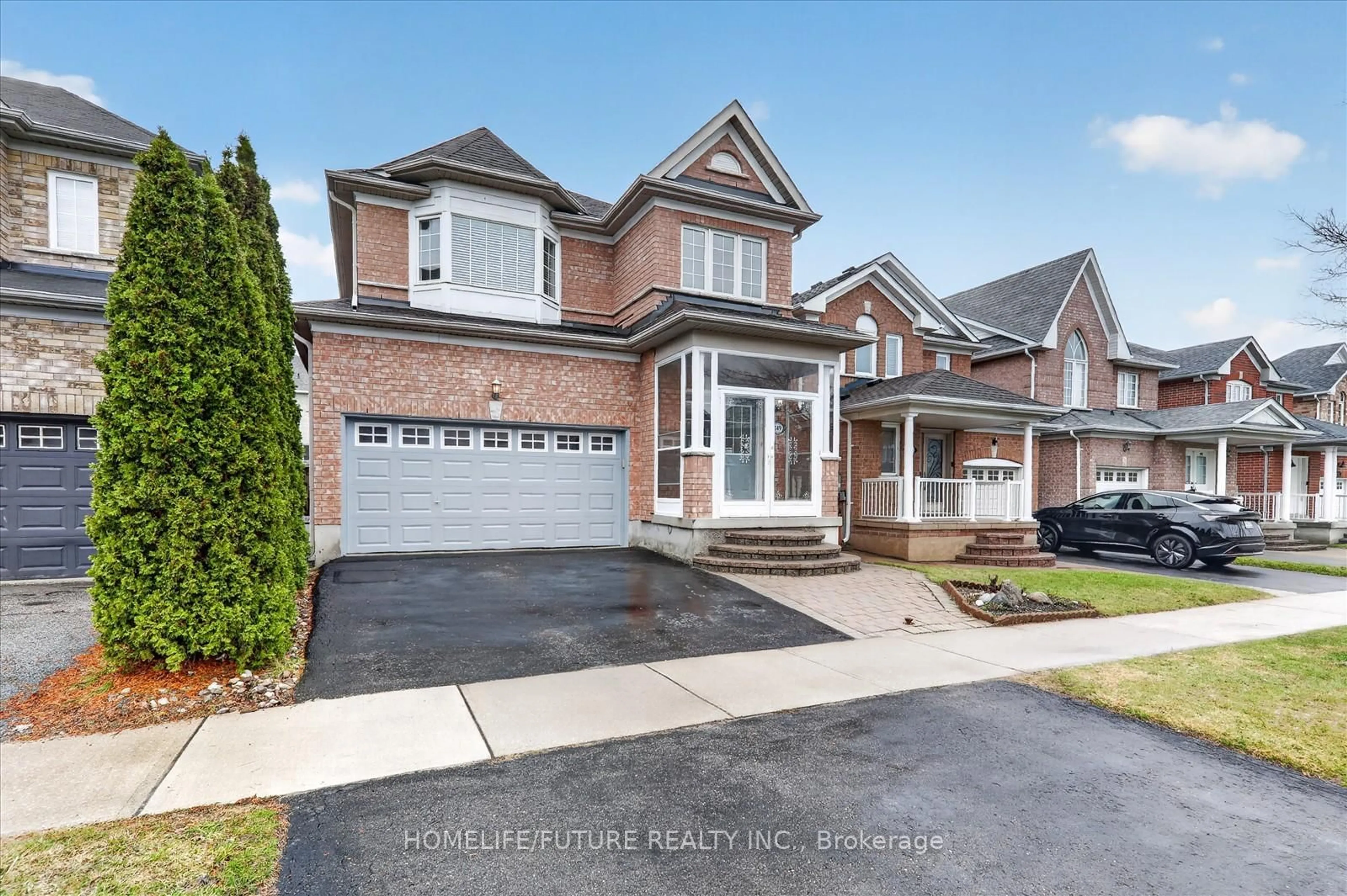 Home with brick exterior material, street for 149 Peshawar Ave, Markham Ontario L3R 0W8
