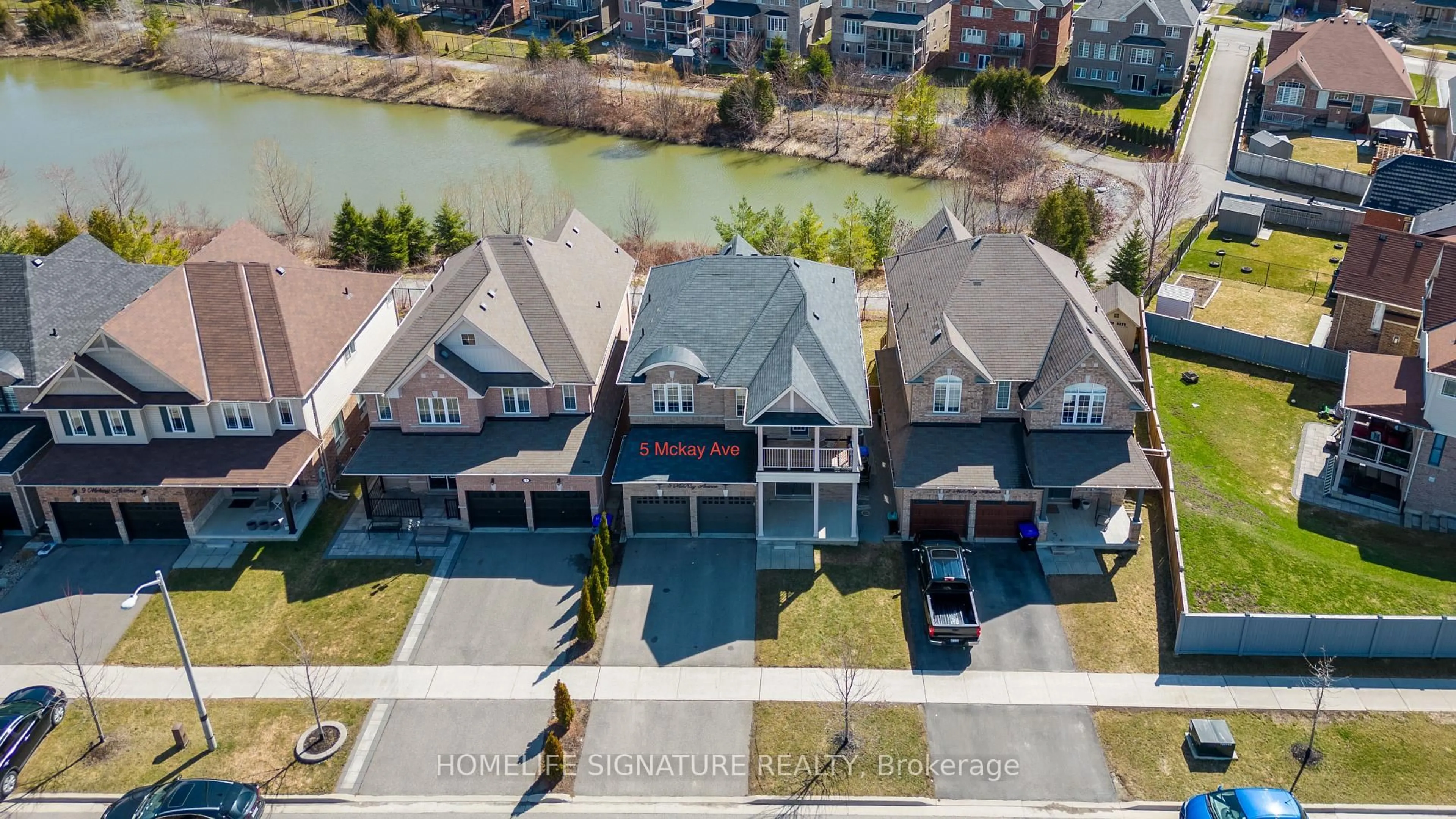 A pic from outside/outdoor area/front of a property/back of a property/a pic from drone, water/lake/river/ocean view for 5 Mckay Ave, New Tecumseth Ontario L0G 1W0