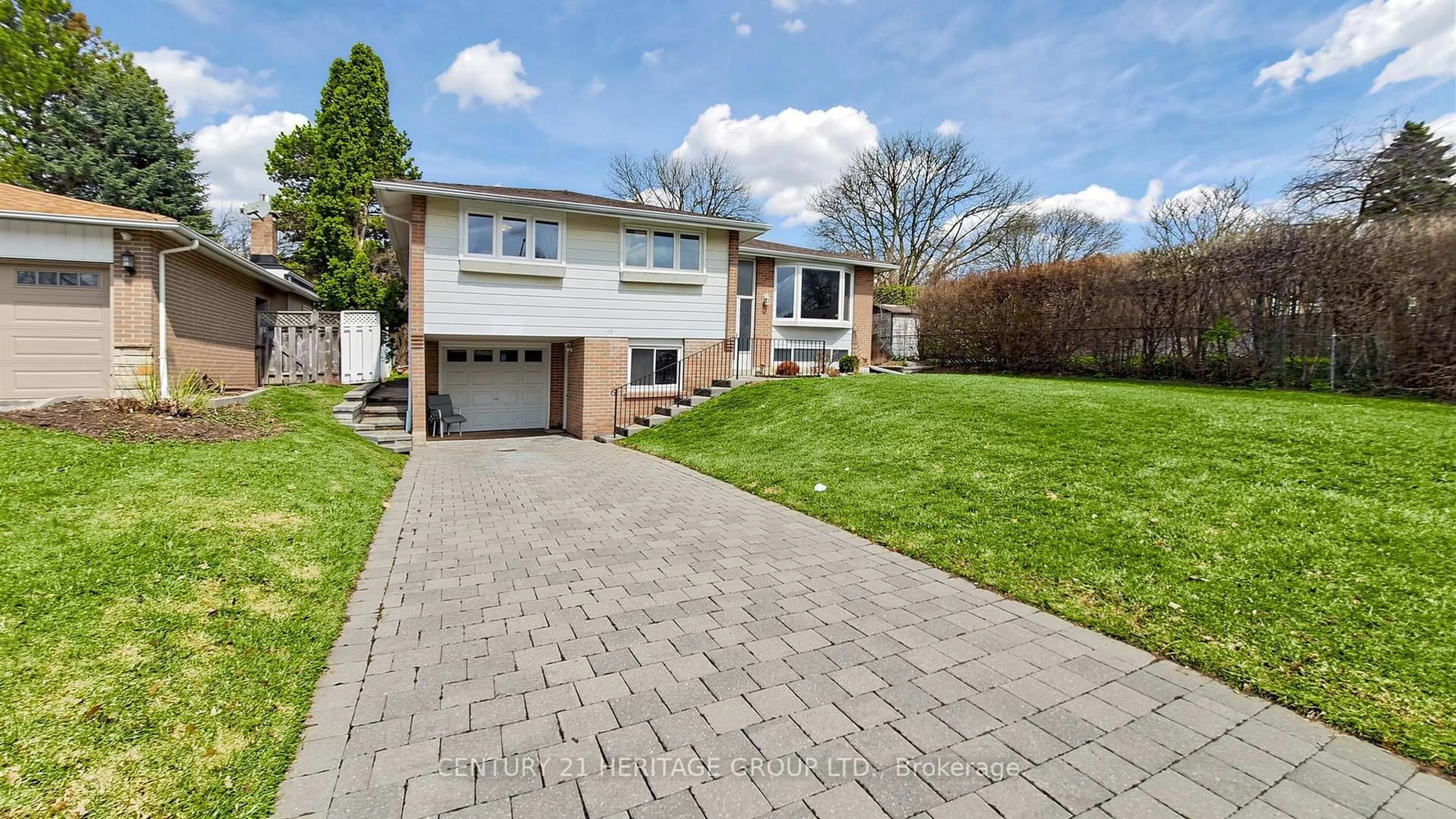 Home with brick exterior material, street for 72 Romfield Crct, Markham Ontario L3T 3H6