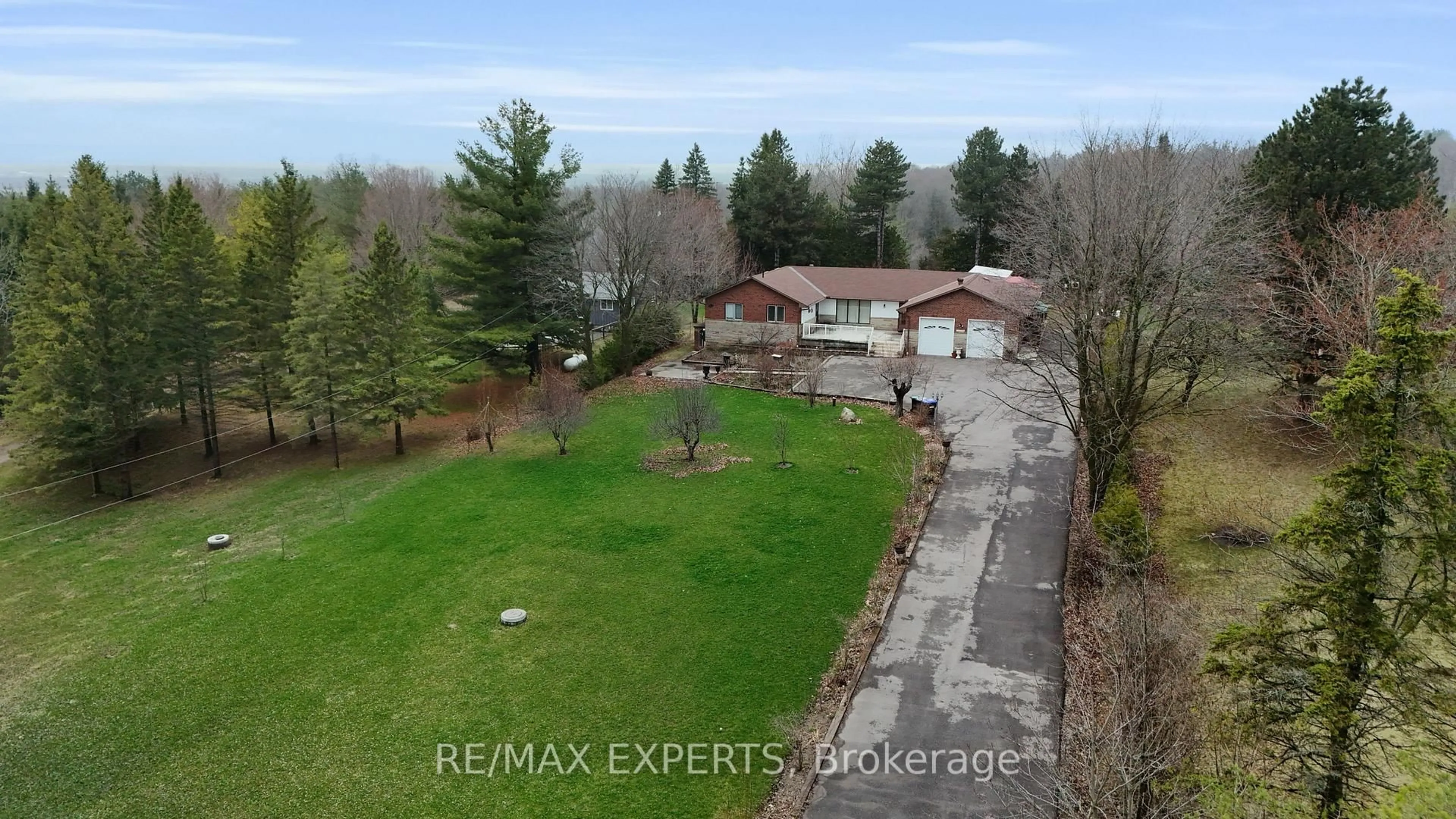 A pic from outside/outdoor area/front of a property/back of a property/a pic from drone, water/lake/river/ocean view for 6242 6th Line, New Tecumseth Ontario L0G 1W0