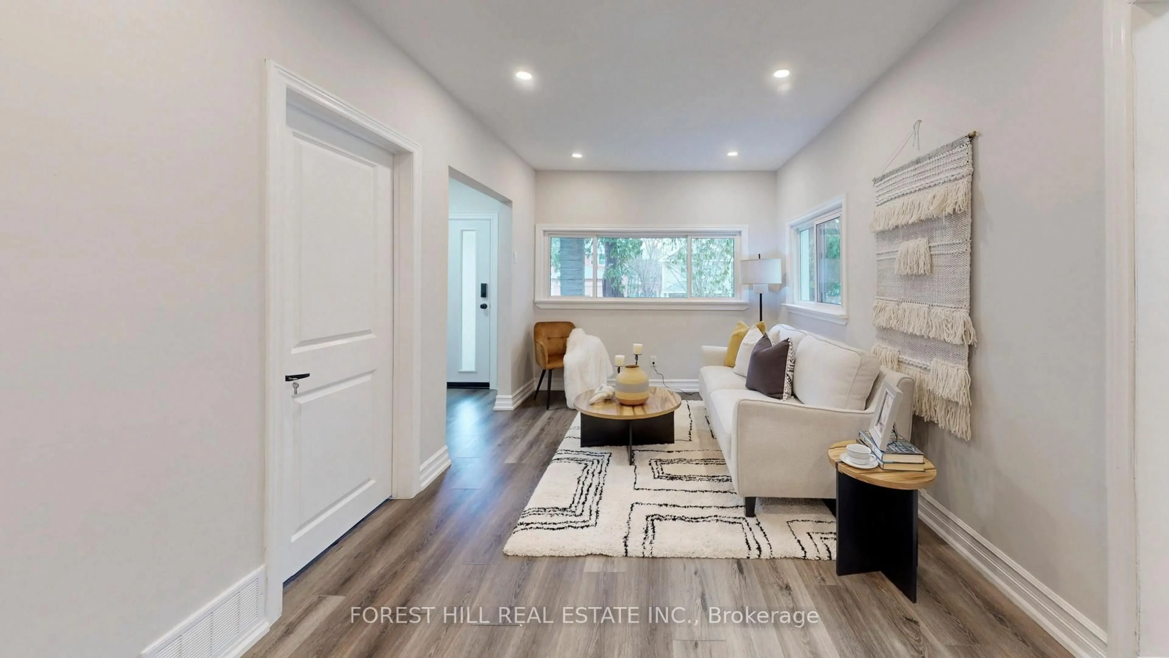 Living room with furniture, wood/laminate floor for 54 Vincent St, Newmarket Ontario L3Y 4G5