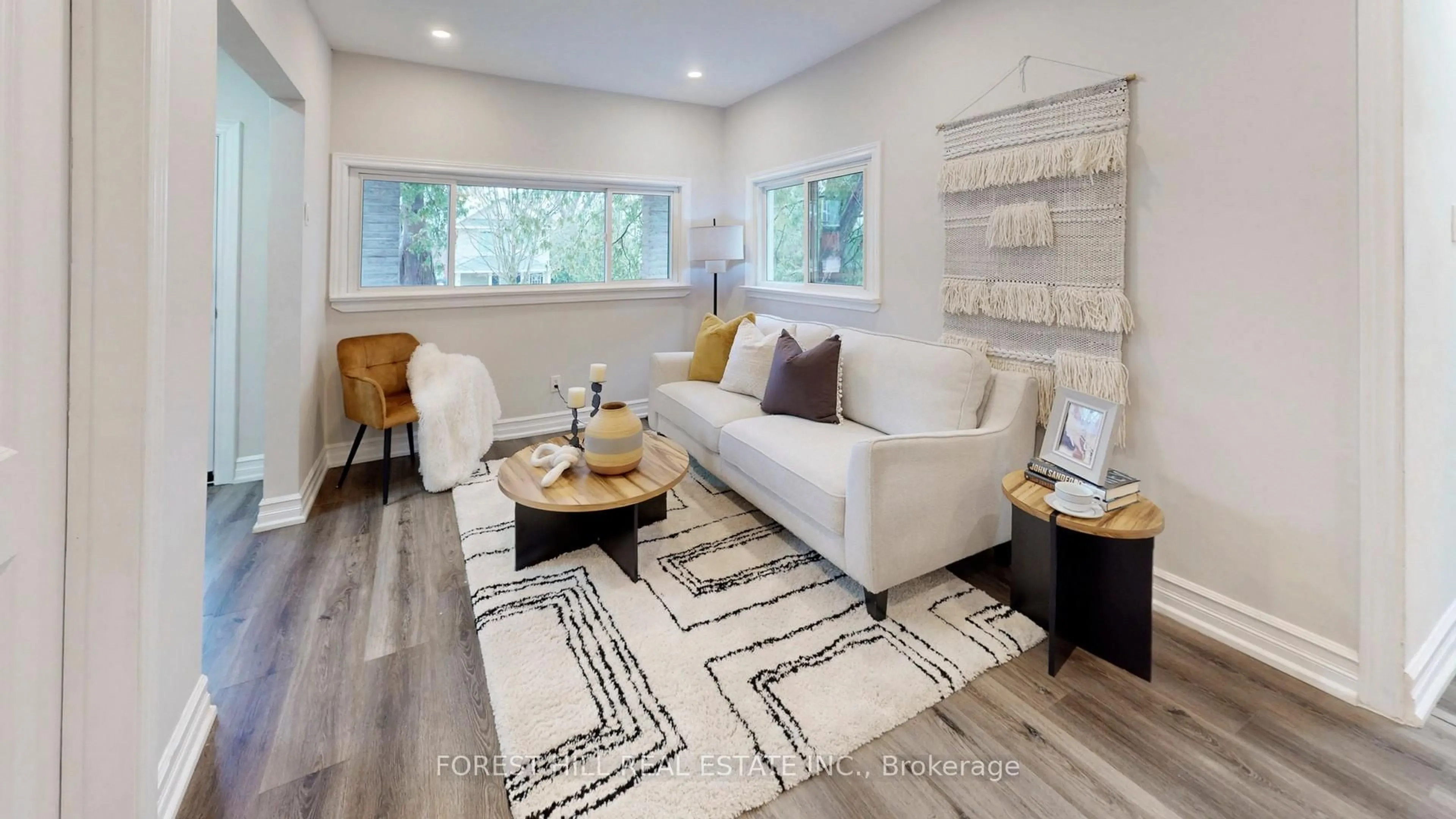 Living room with furniture, wood/laminate floor for 54 Vincent St, Newmarket Ontario L3Y 4G5