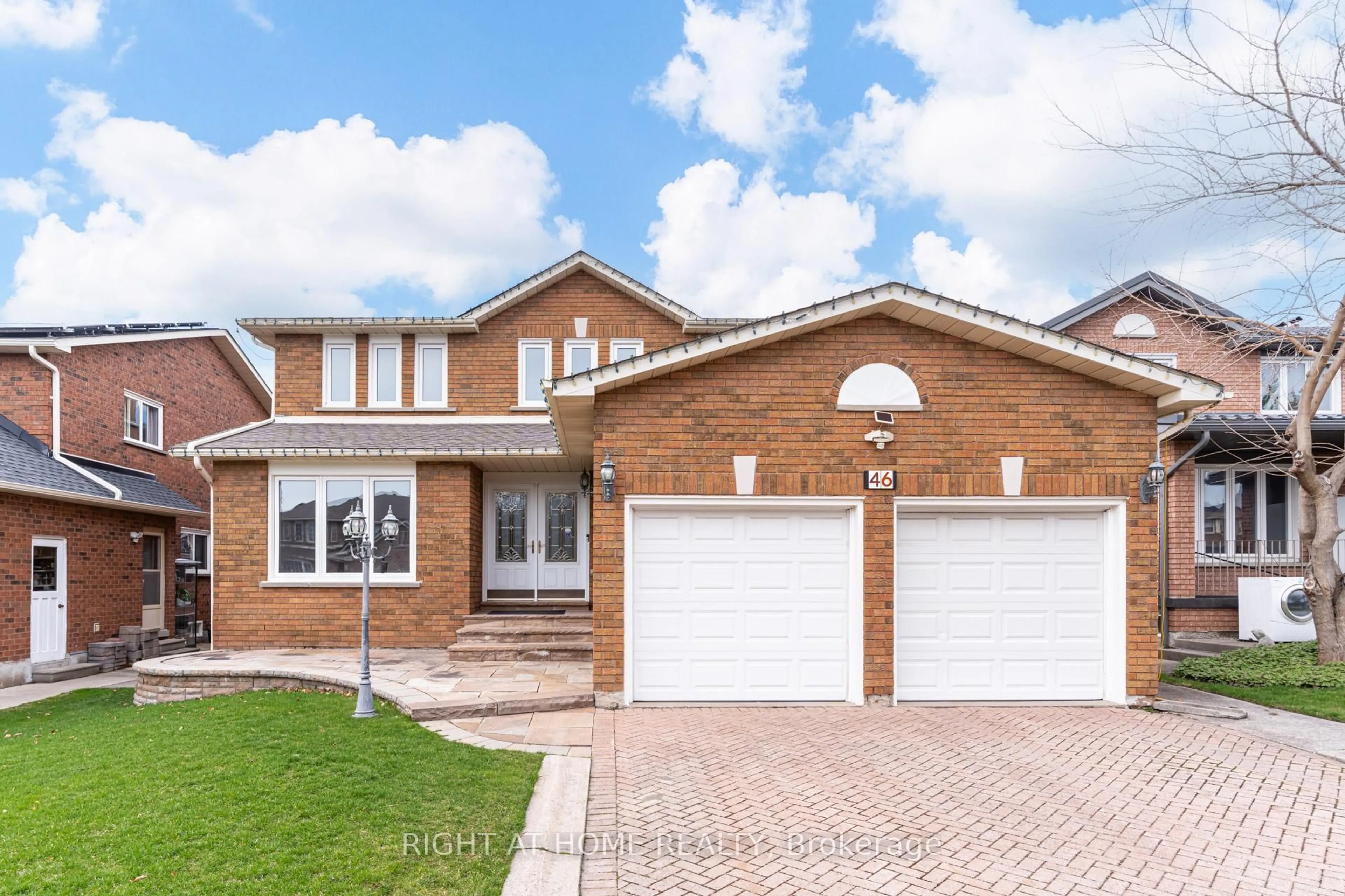Home with brick exterior material, street for 46 Hewlett Cres, Markham Ontario L3P 7J8
