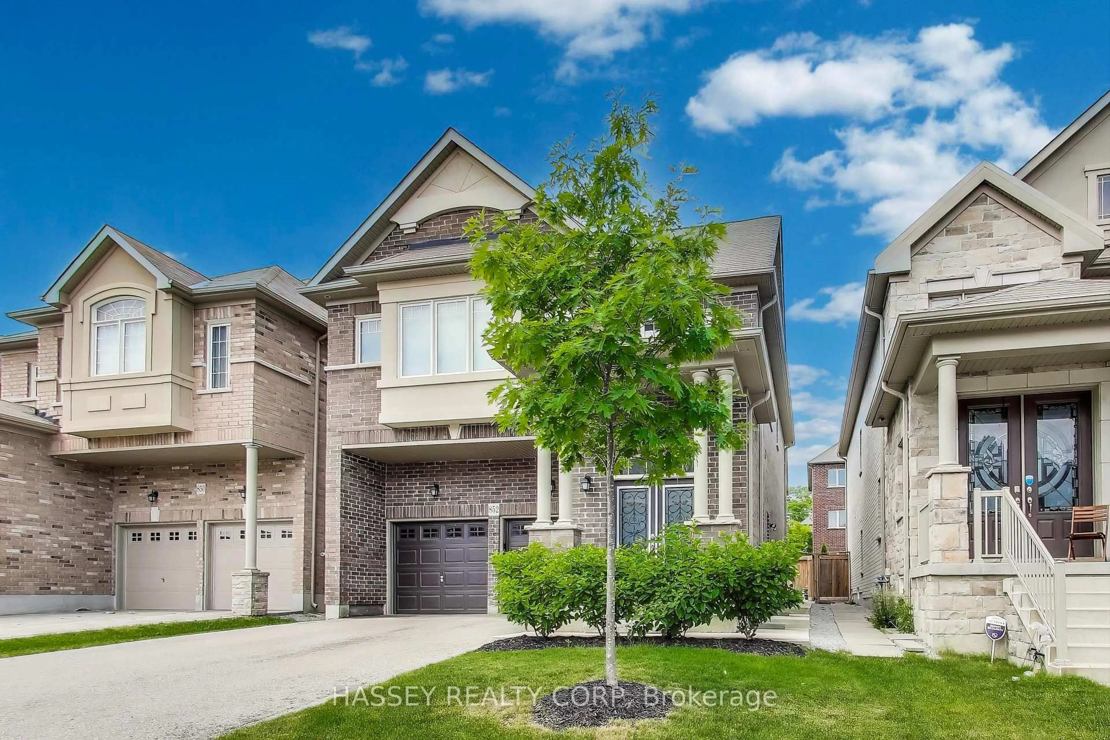 Home with brick exterior material, street for 852 Elvidge Tr, Newmarket Ontario L3X 0J7