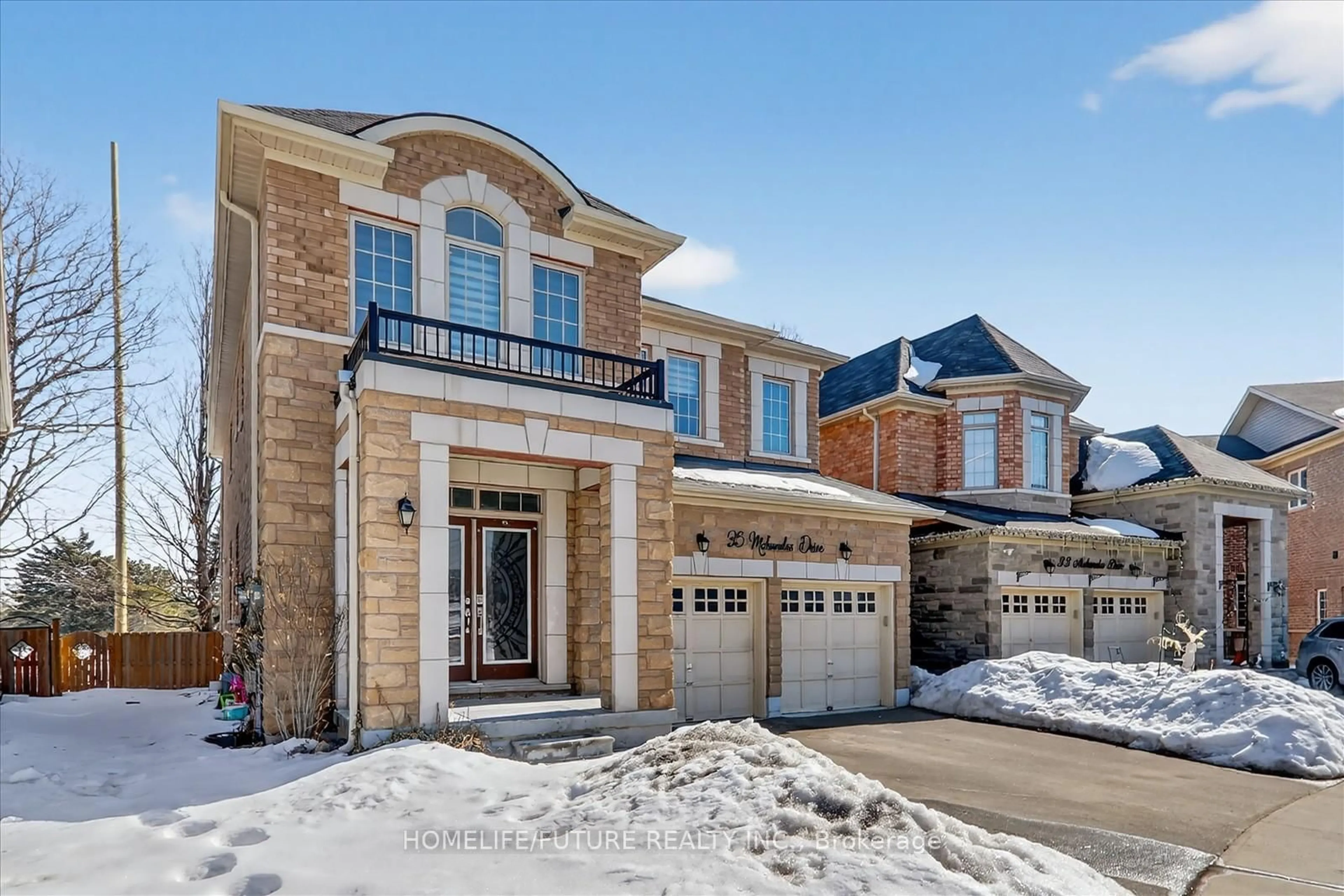 Home with brick exterior material, street for 35 Mohandas Dr, Markham Ontario L3S 0E5