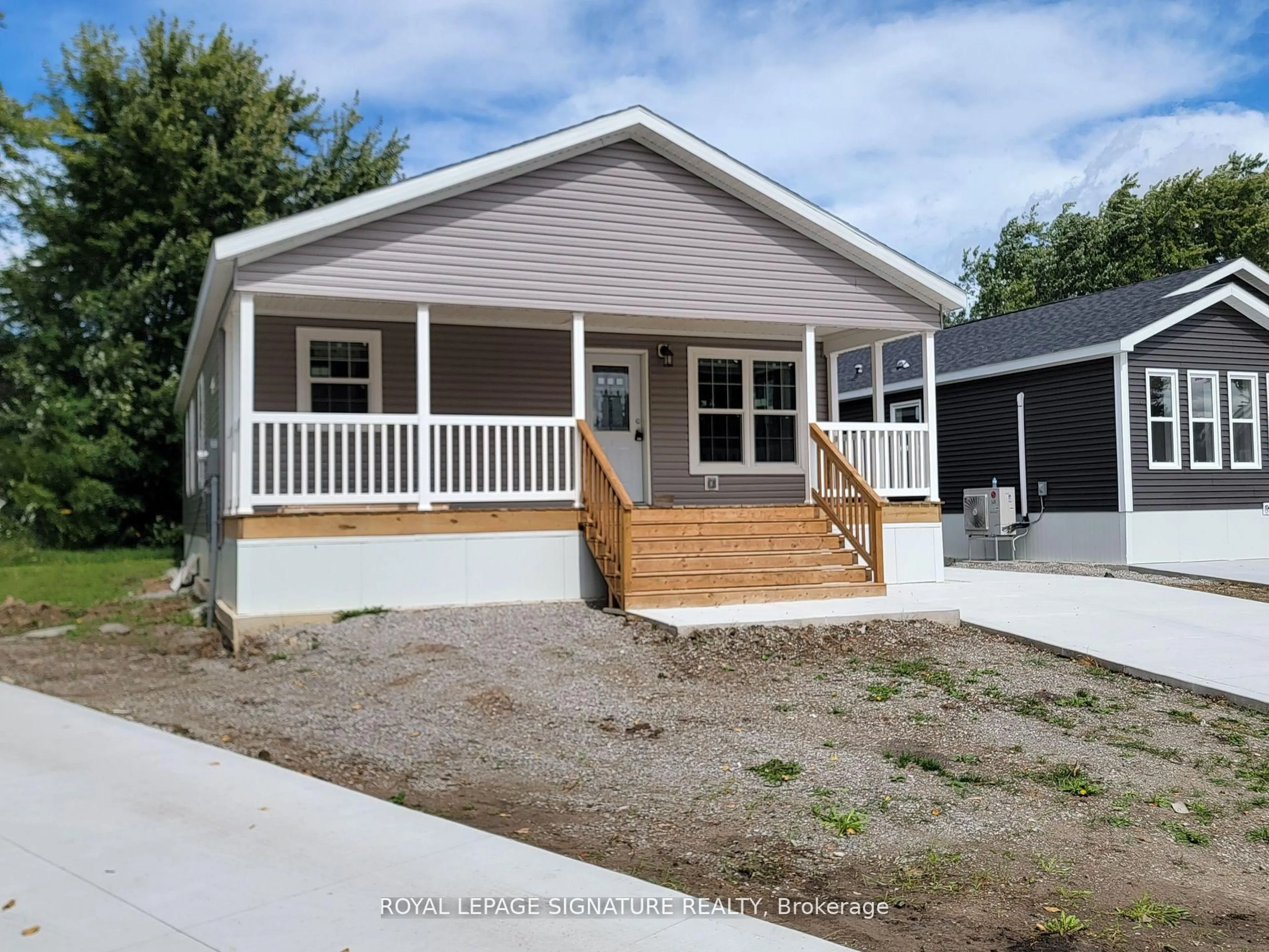 Home with vinyl exterior material, street for 12 Briarwood Pl, Innisfil Ontario L0L 1L0