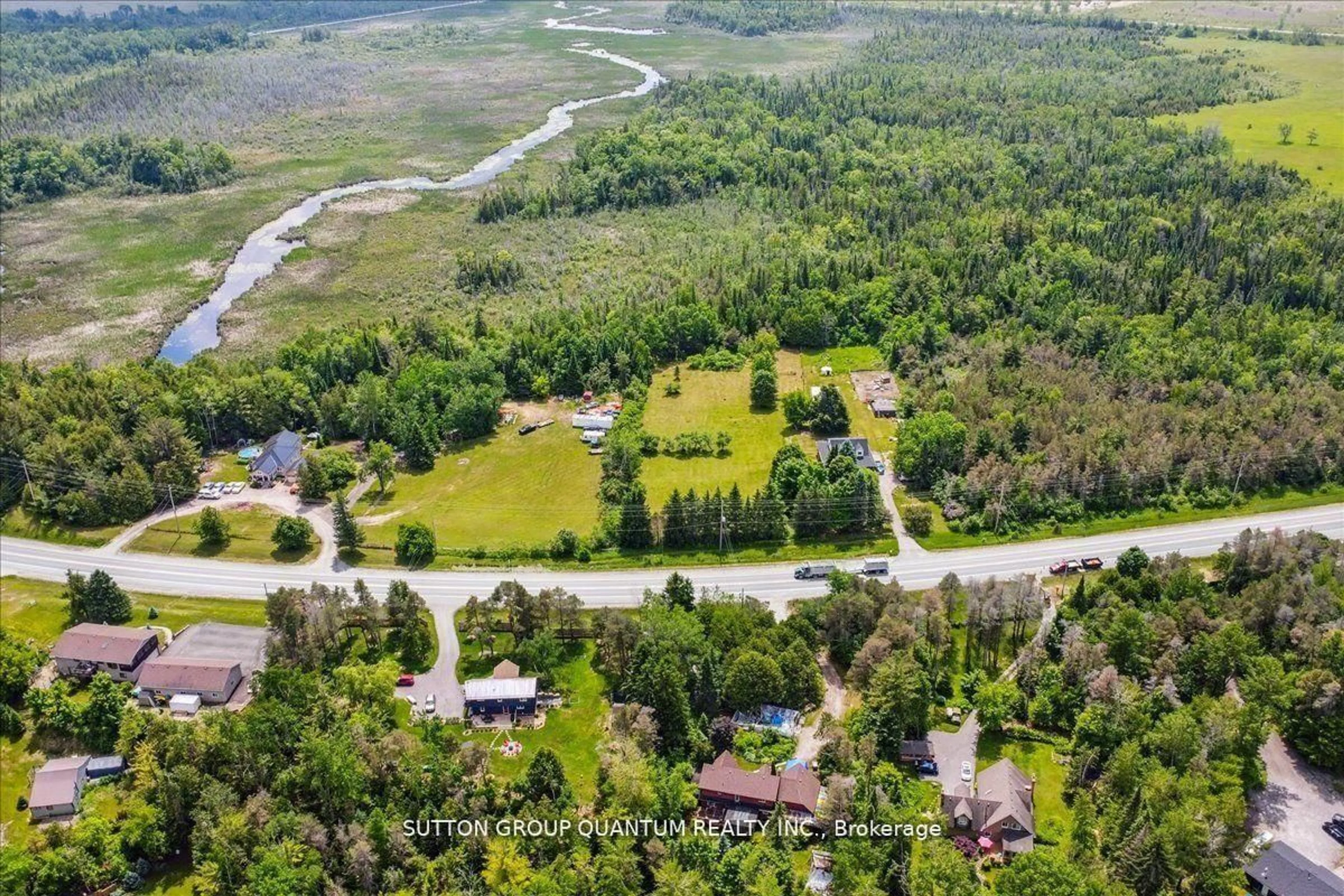 A pic from outside/outdoor area/front of a property/back of a property/a pic from drone, forest/trees view for 12700 Highway 12, Brock Ontario L0C 1H0
