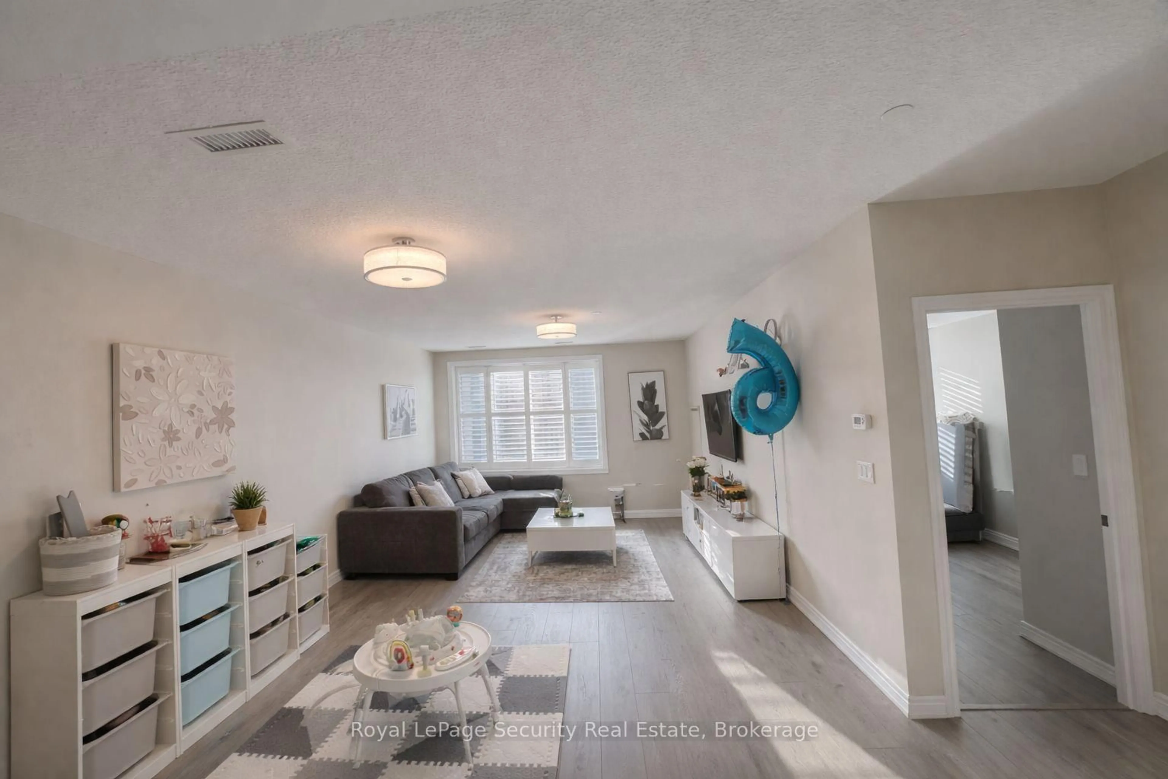 Living room with furniture, unknown for 7400 Markham Rd #203, Markham Ontario L3S 0C5