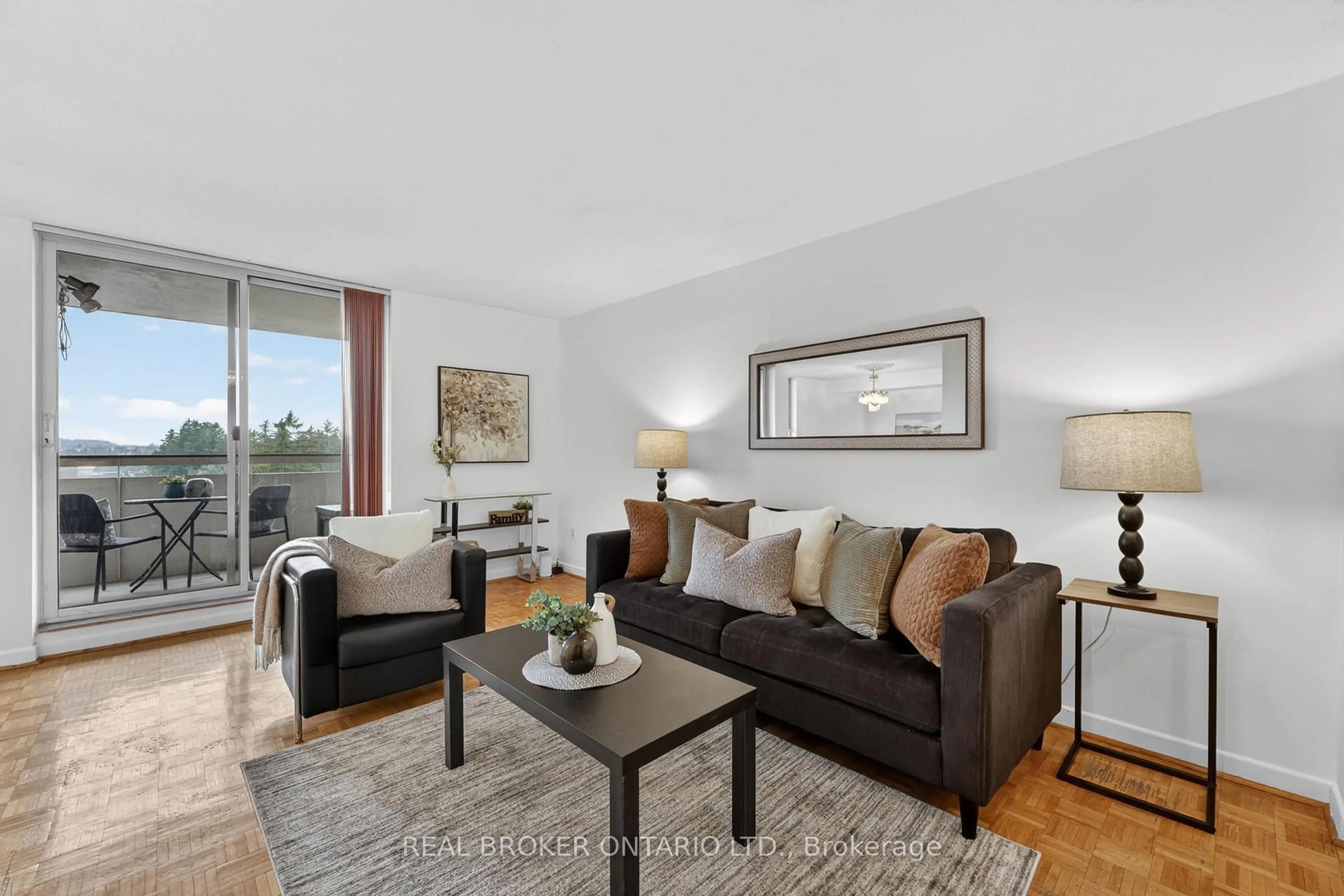 Living room with furniture, wood/laminate floor for 80 Inverlochy Blvd #901, Markham Ontario L3T 4P3
