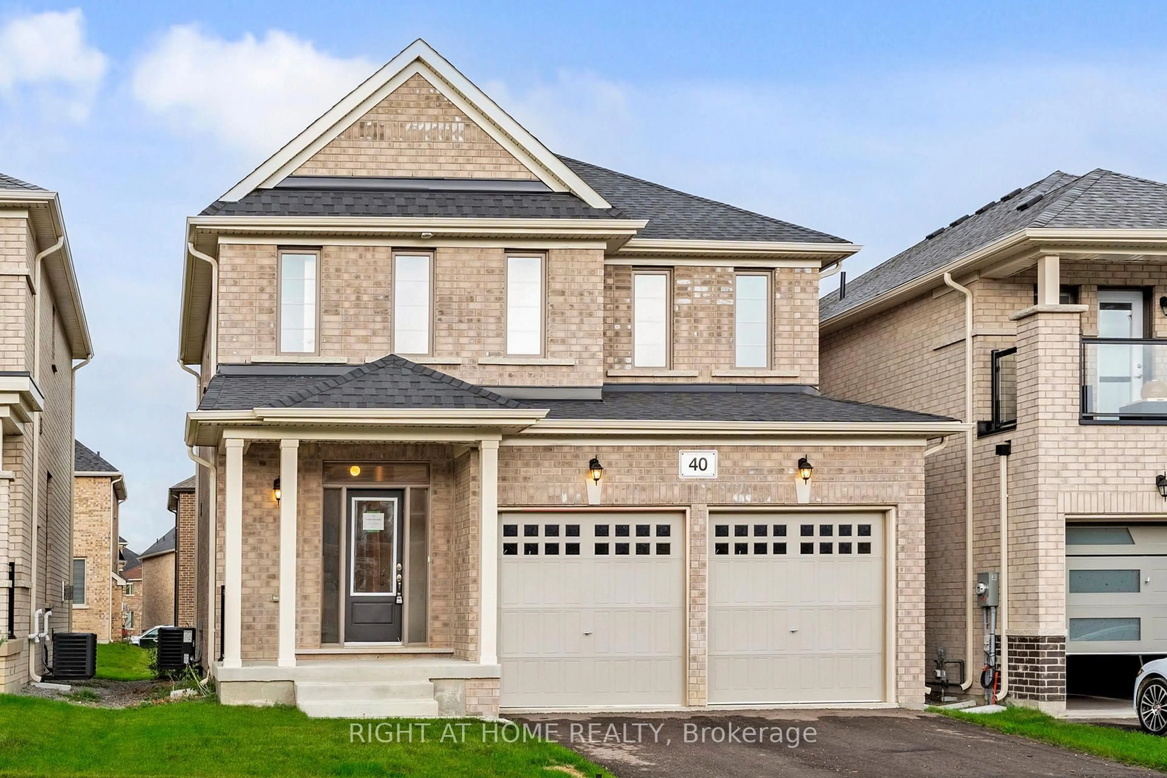 Home with brick exterior material, street for 40 Ainslie Hill Cres, Georgina Ontario L0E 1R0