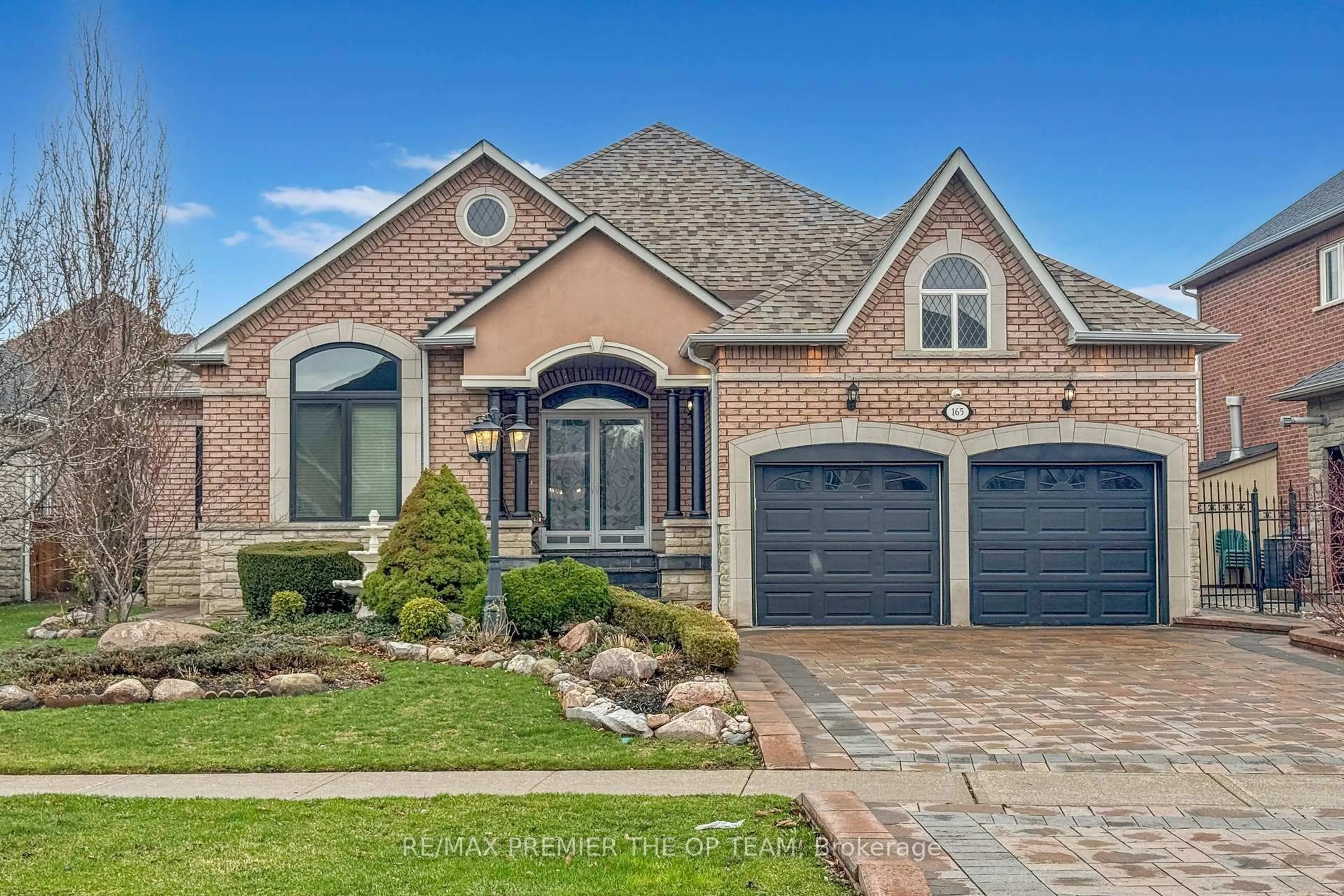 Home with brick exterior material, street for 165 Novaview Cres, Vaughan Ontario L4L 9L8