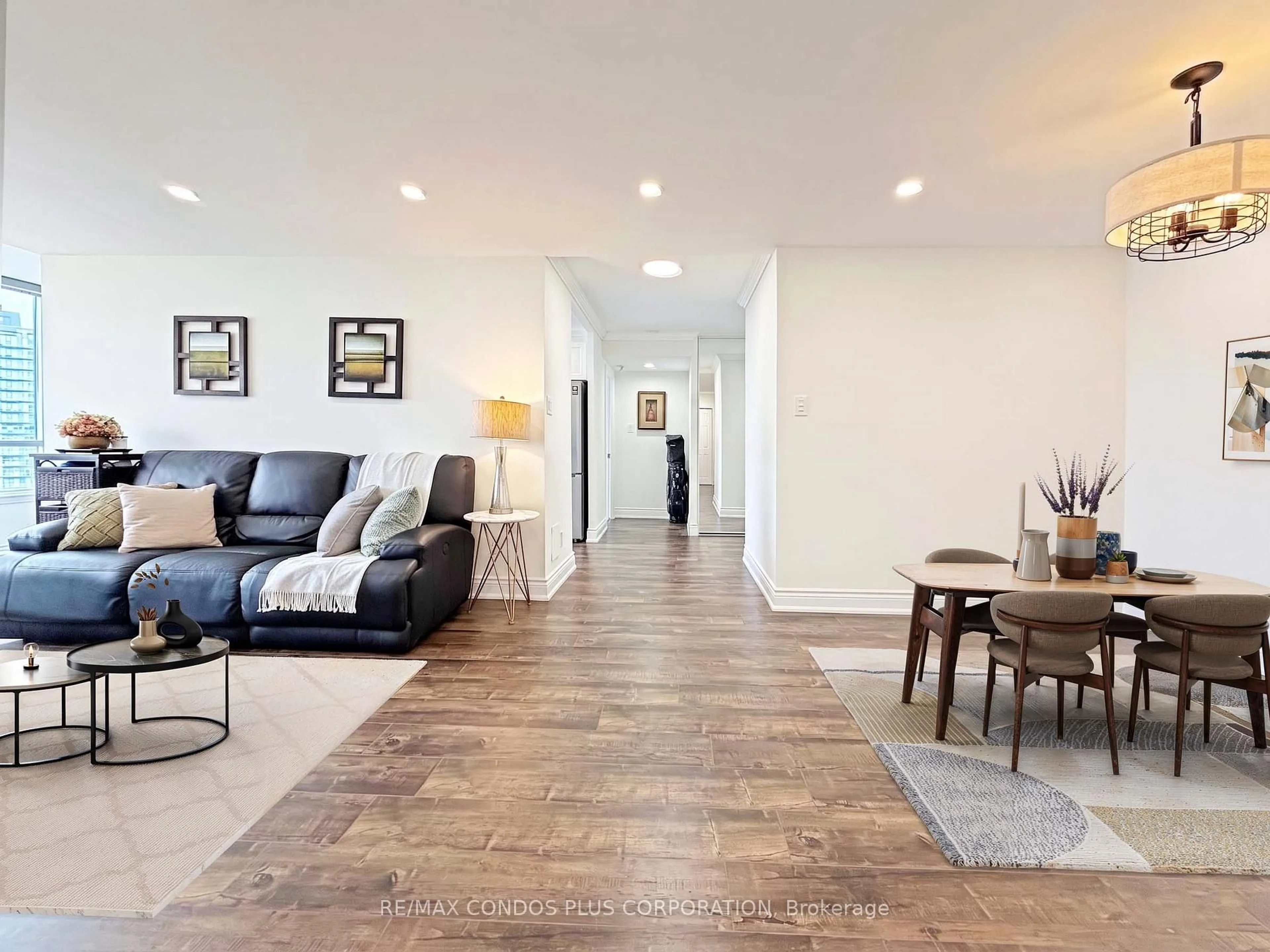 Living room with furniture, wood/laminate floor for 120 Promenade Circ #1509, Vaughan Ontario L4J 7W9