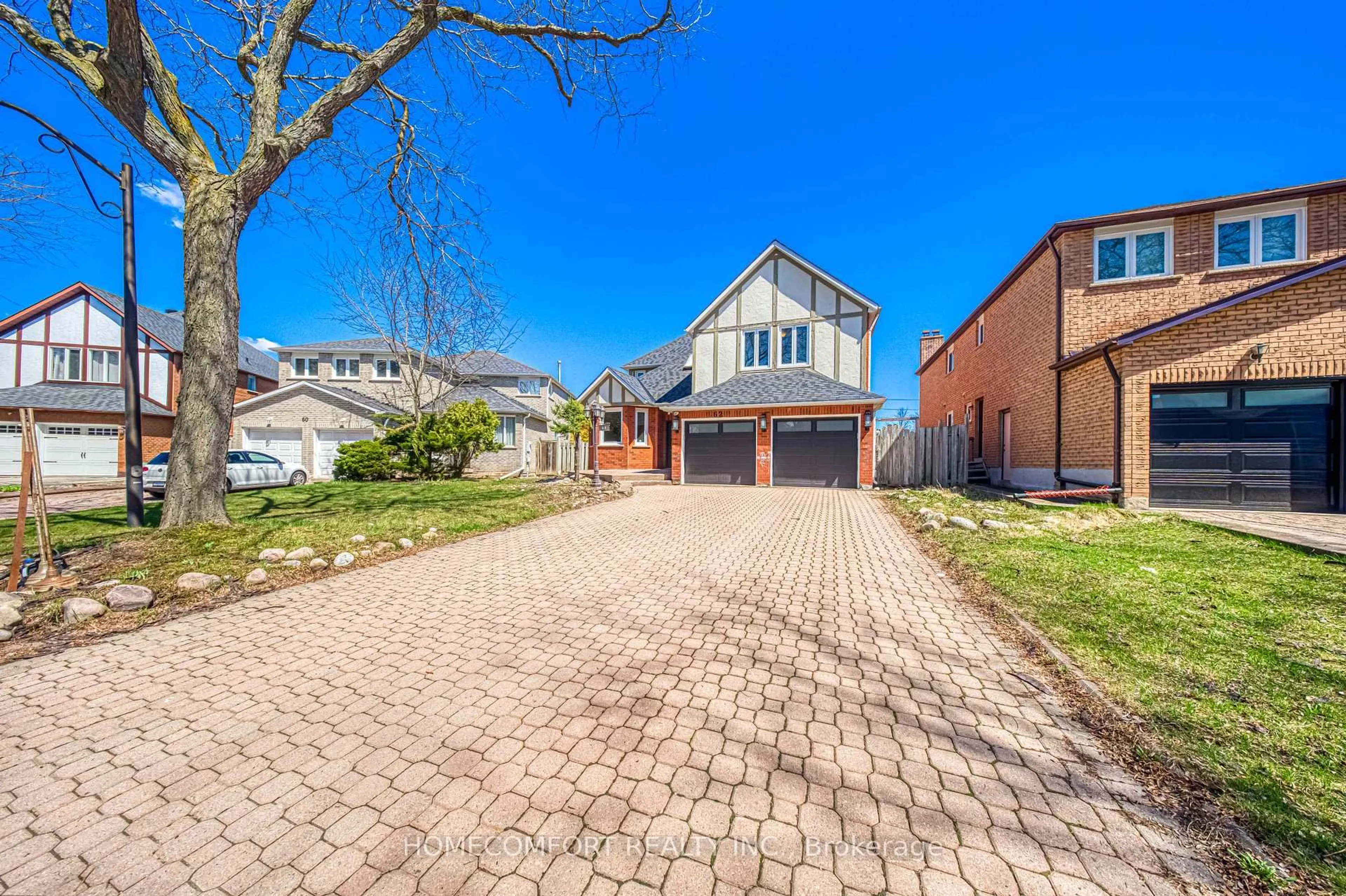 Home with brick exterior material, street for 62 Soho Cres, Markham Ontario L3P 7H5