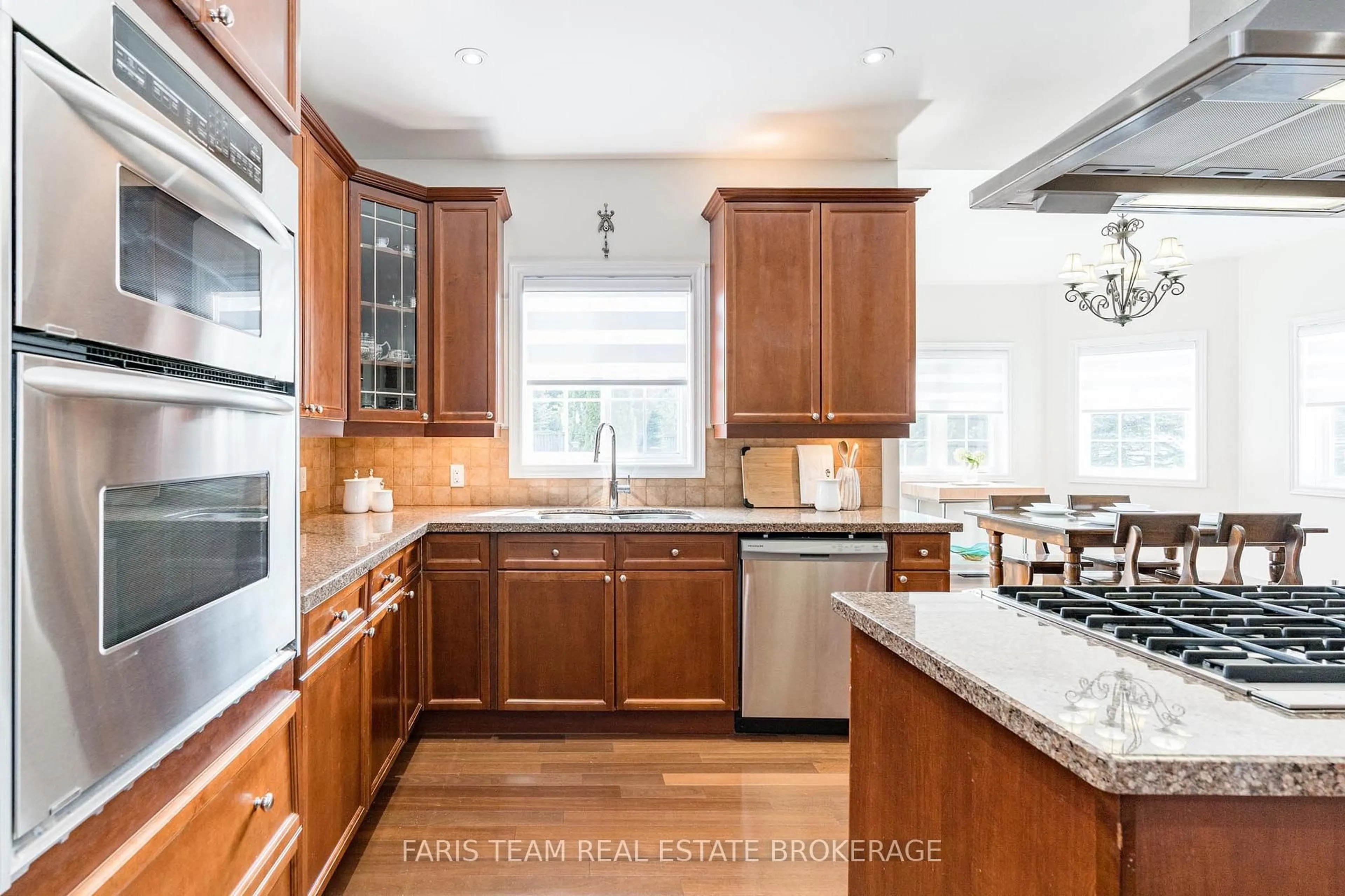 Open concept kitchen, ceramic/tile floor for 39 Vanderpost Cres, Essa Ontario L0L 2N0