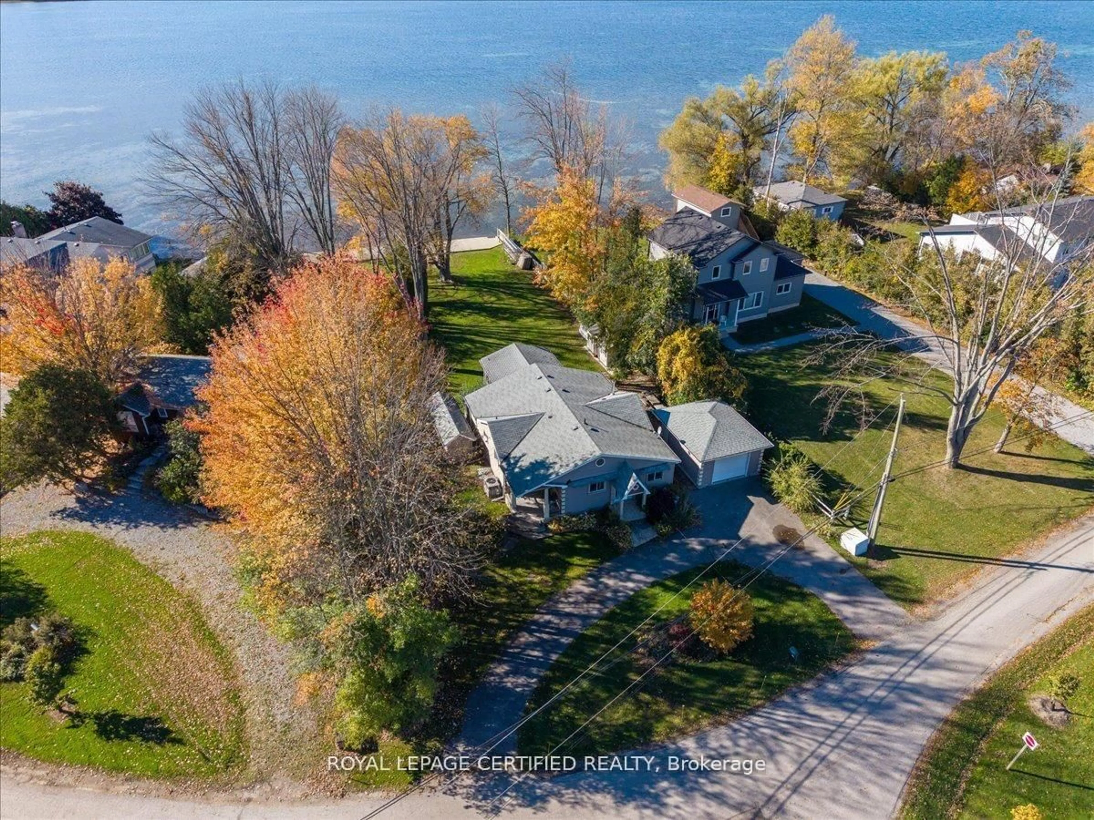 A pic from outside/outdoor area/front of a property/back of a property/a pic from drone, water/lake/river/ocean view for 598 Duclos Point Rd, Georgina Ontario L0E 1N0