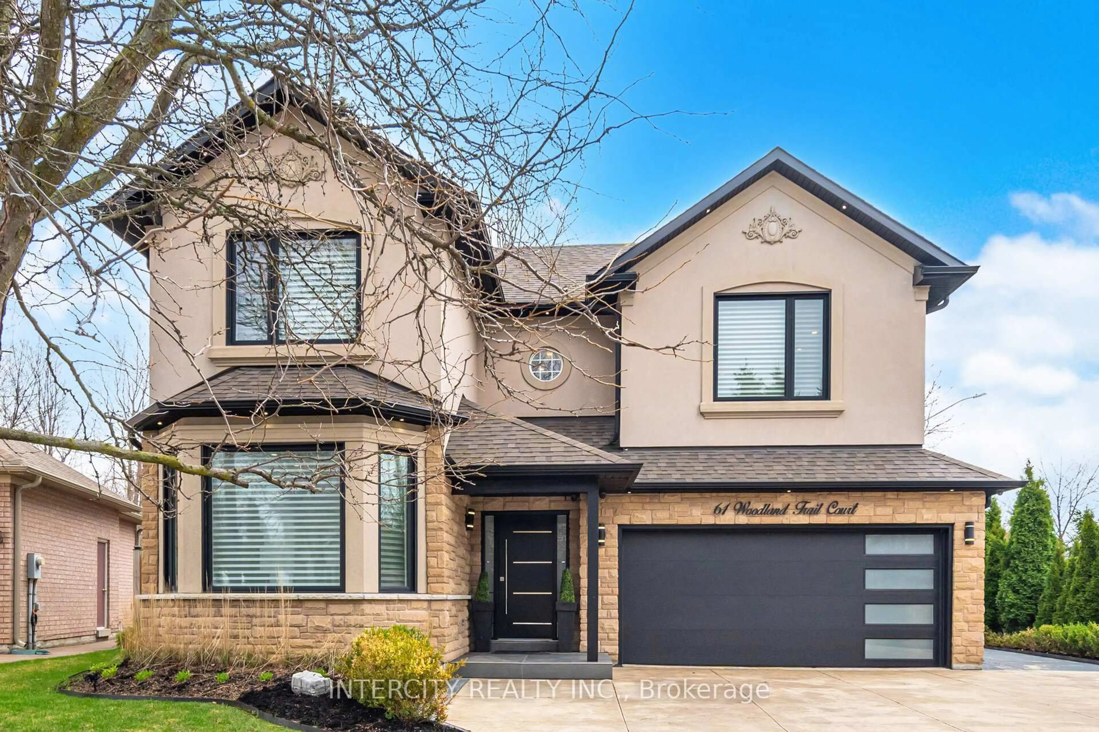 Home with brick exterior material, street for 61 Woodland Trail Crt, Vaughan Ontario L4L 9H9