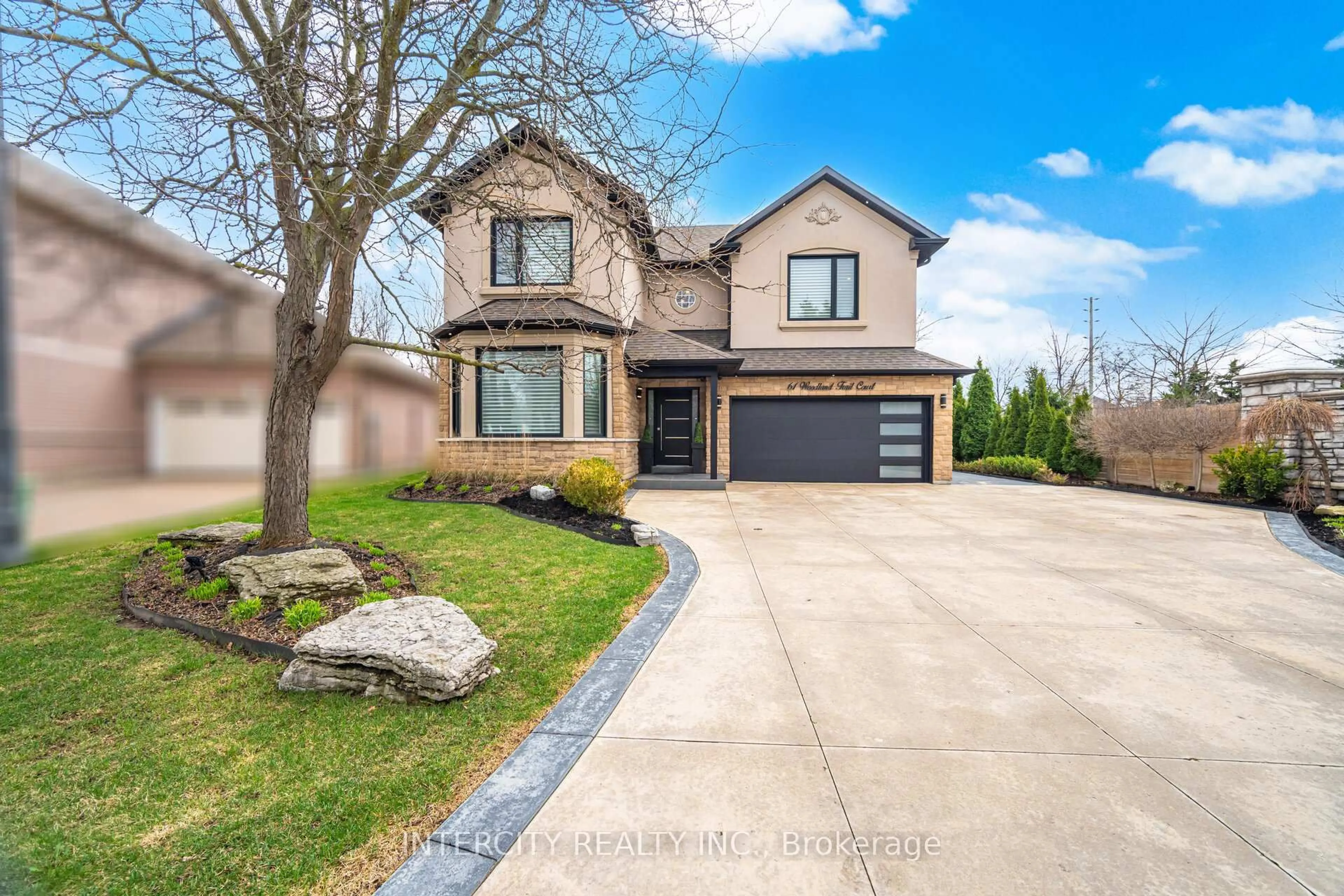 Home with brick exterior material, street for 61 Woodland Trail Crt, Vaughan Ontario L4L 9H9